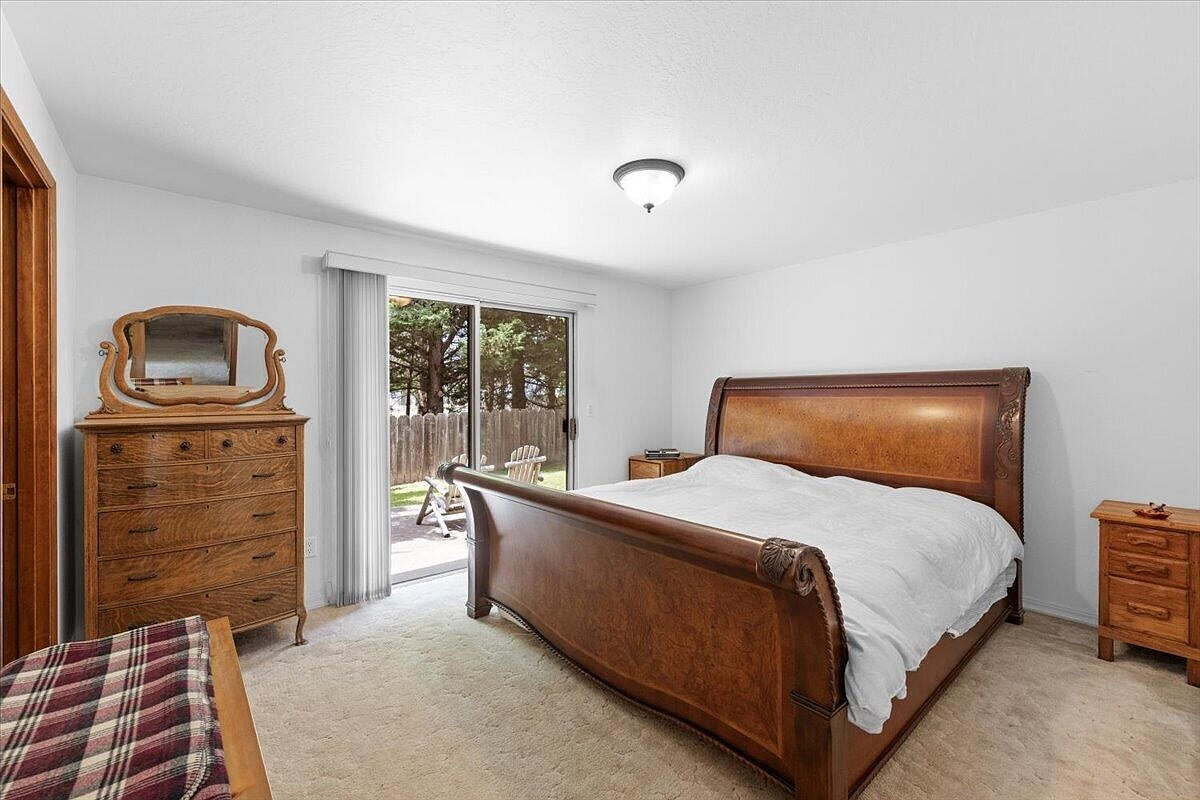 Master bedroom with sliding glass door