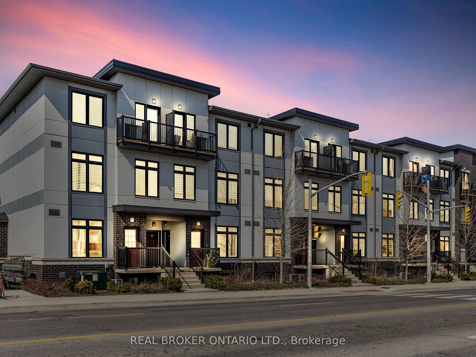 Townhouse complex exterior at twilight