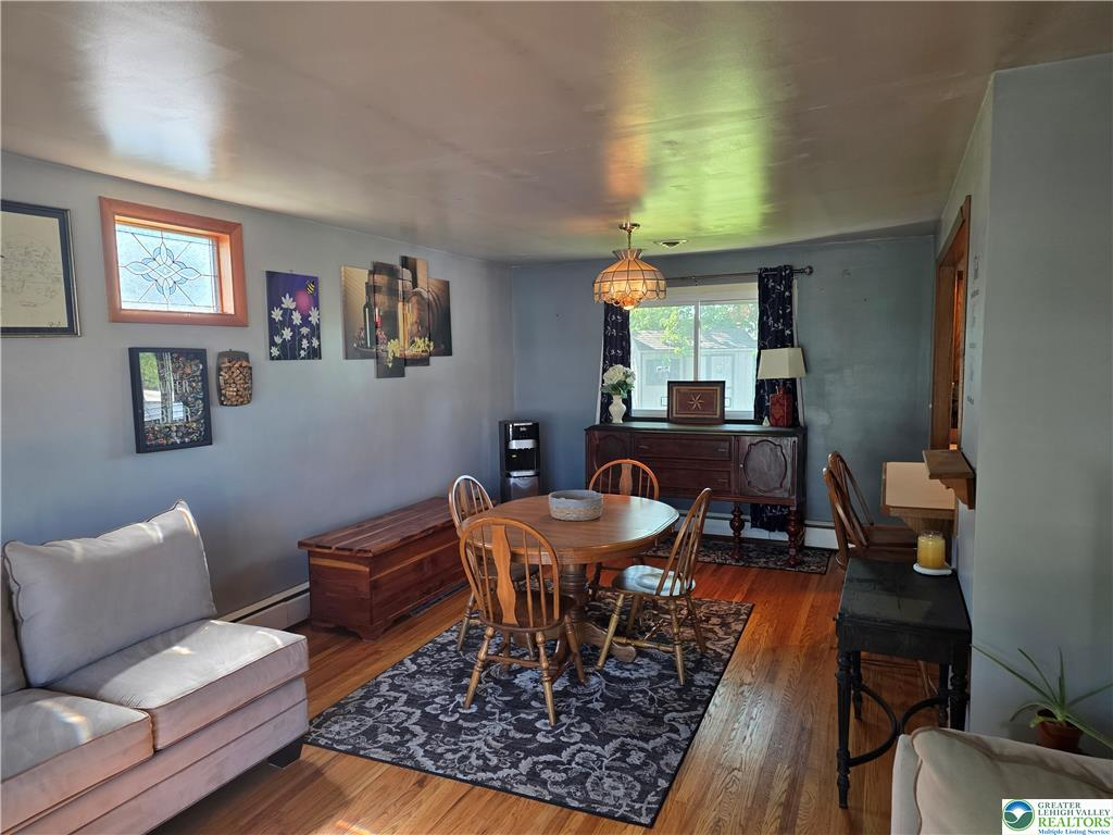 Formal dining room with hardwood floors