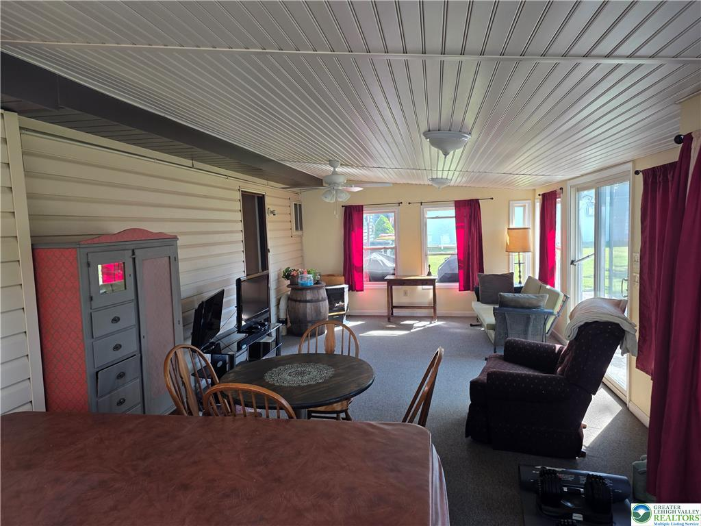 Sunroom living area with sliding glass doors