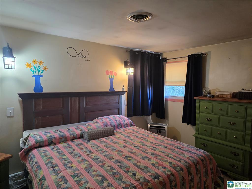 Master bedroom with sconces