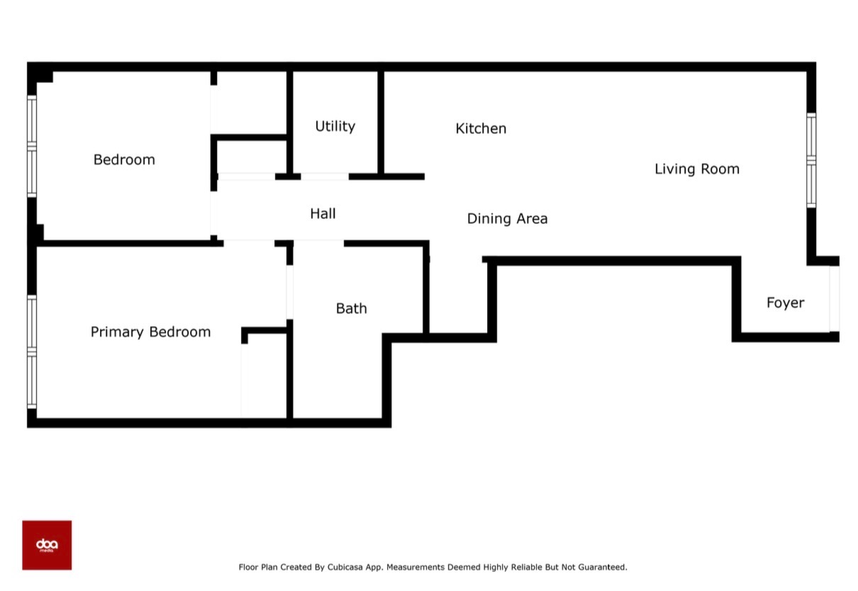2D floor plan showing the 2-bedroom, 1-bath unit layout with entry foyer, open-concept kitchen, dining, and living area