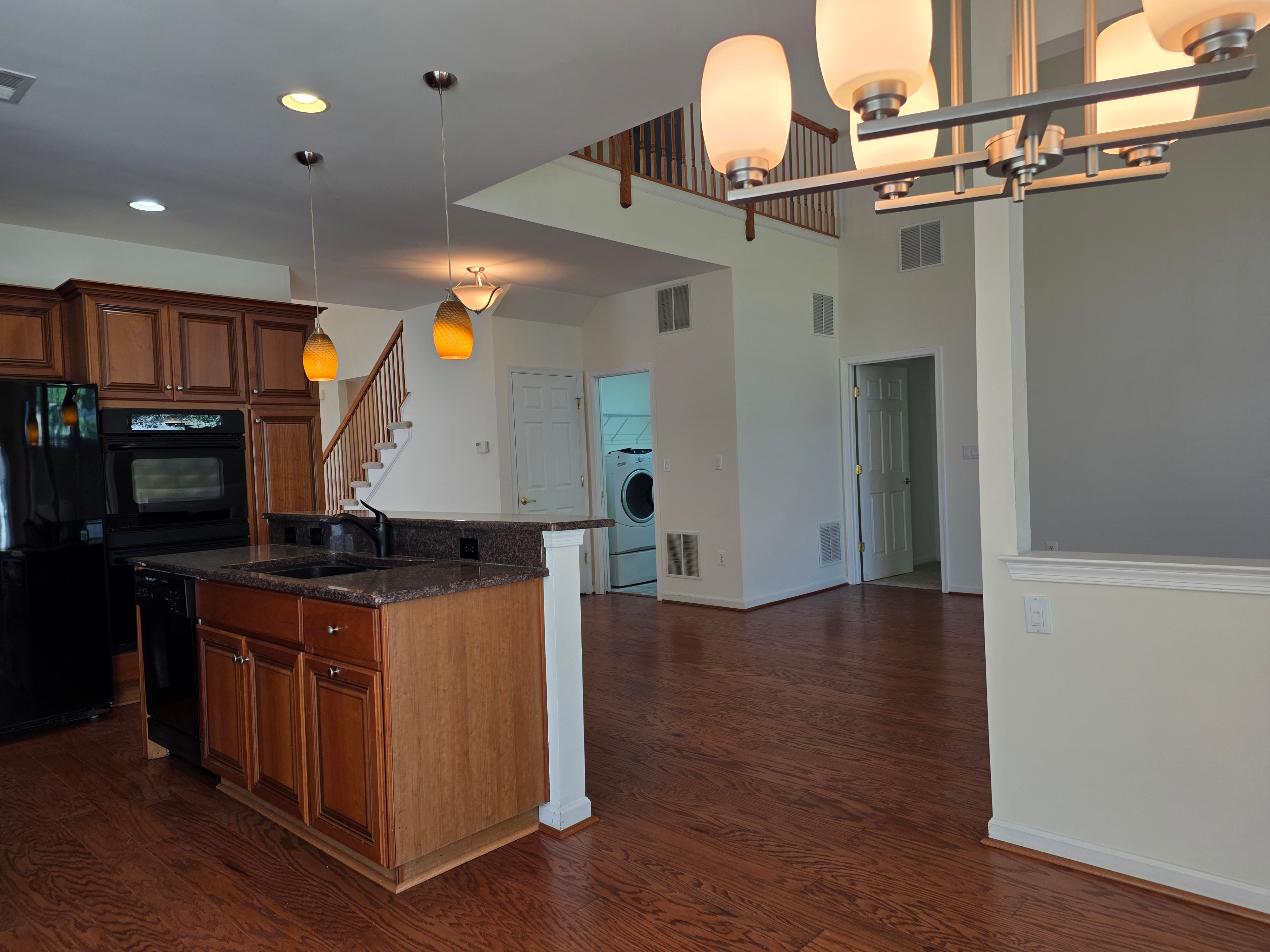Kitchen to living area view with open floor plan