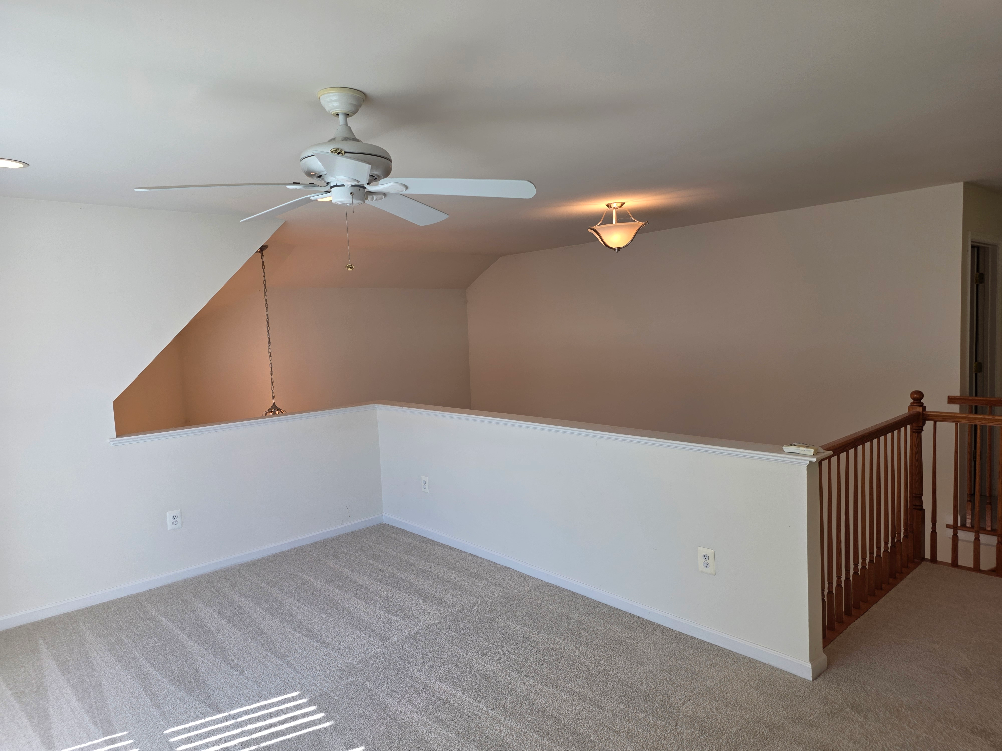 Spacious loft area with vaulted ceilings