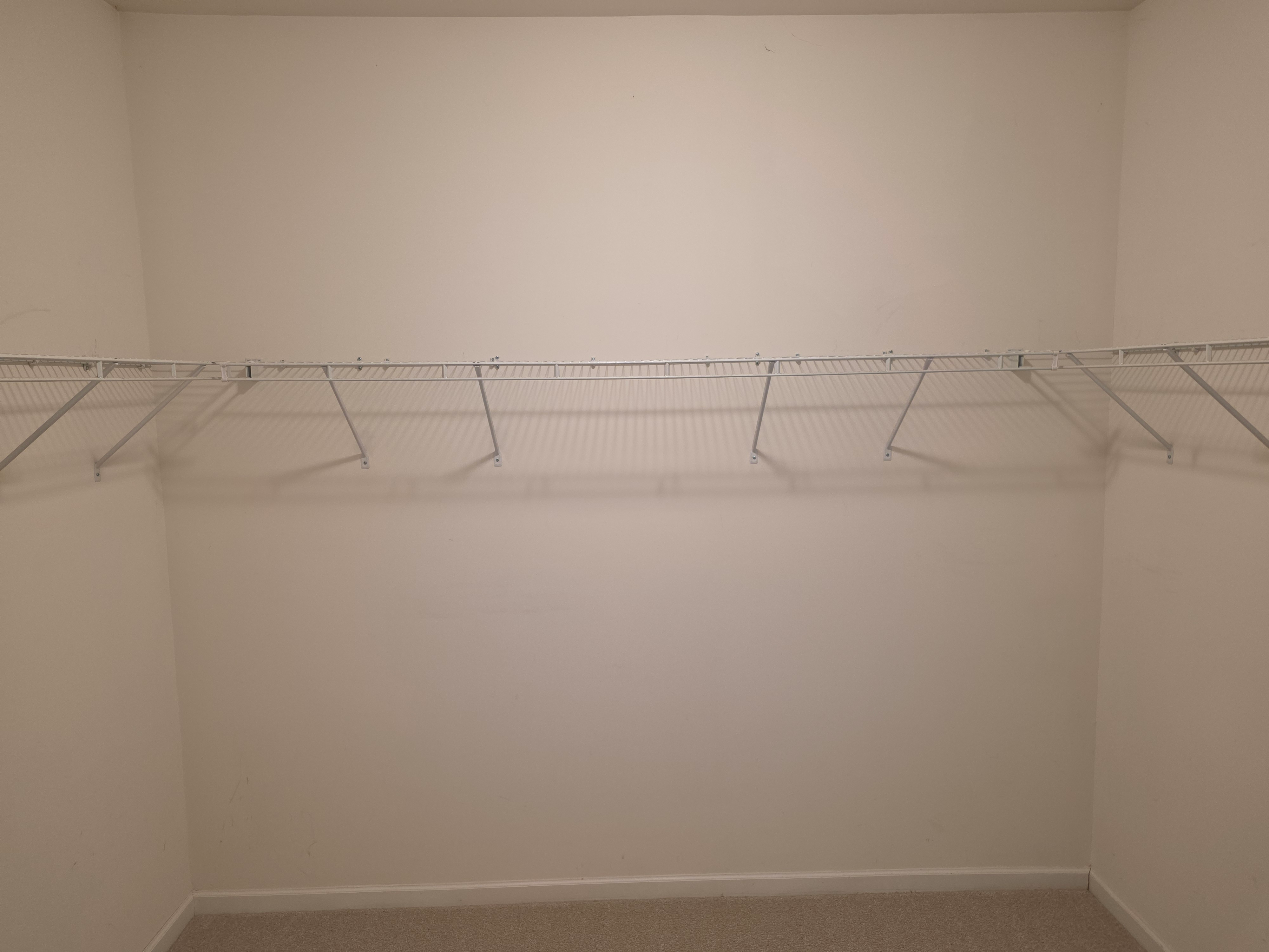 Walk-in closet with wire shelving system