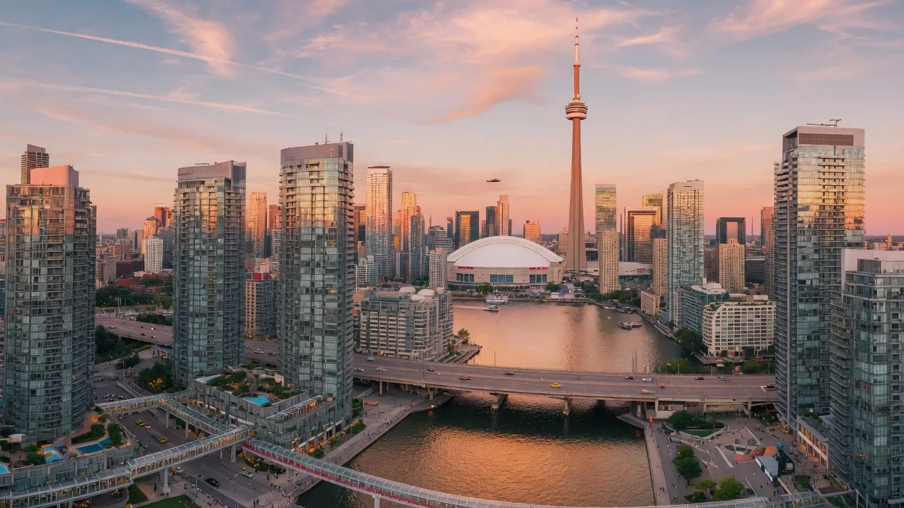 Toronto's CityPlace skyline at golden hour with glass condo towers along Lake Ontario