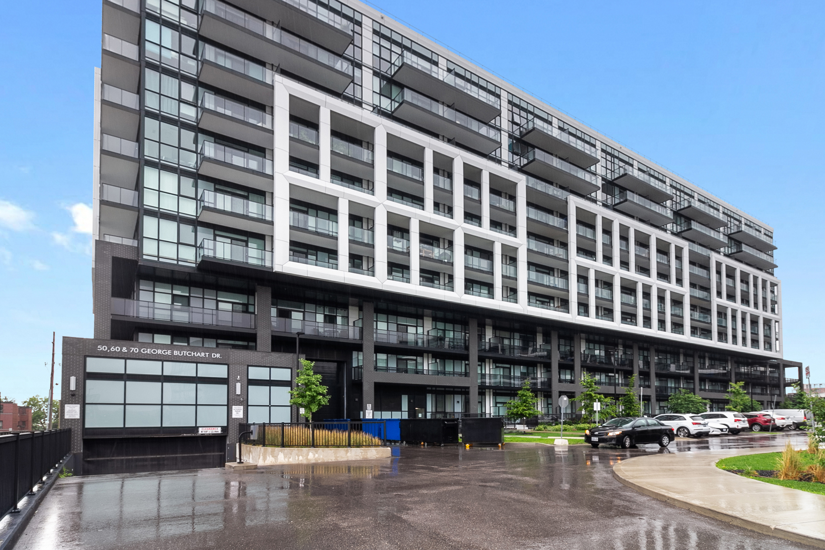 Modern condo building at 50 George Butchart Drive in Downsview Park, North York