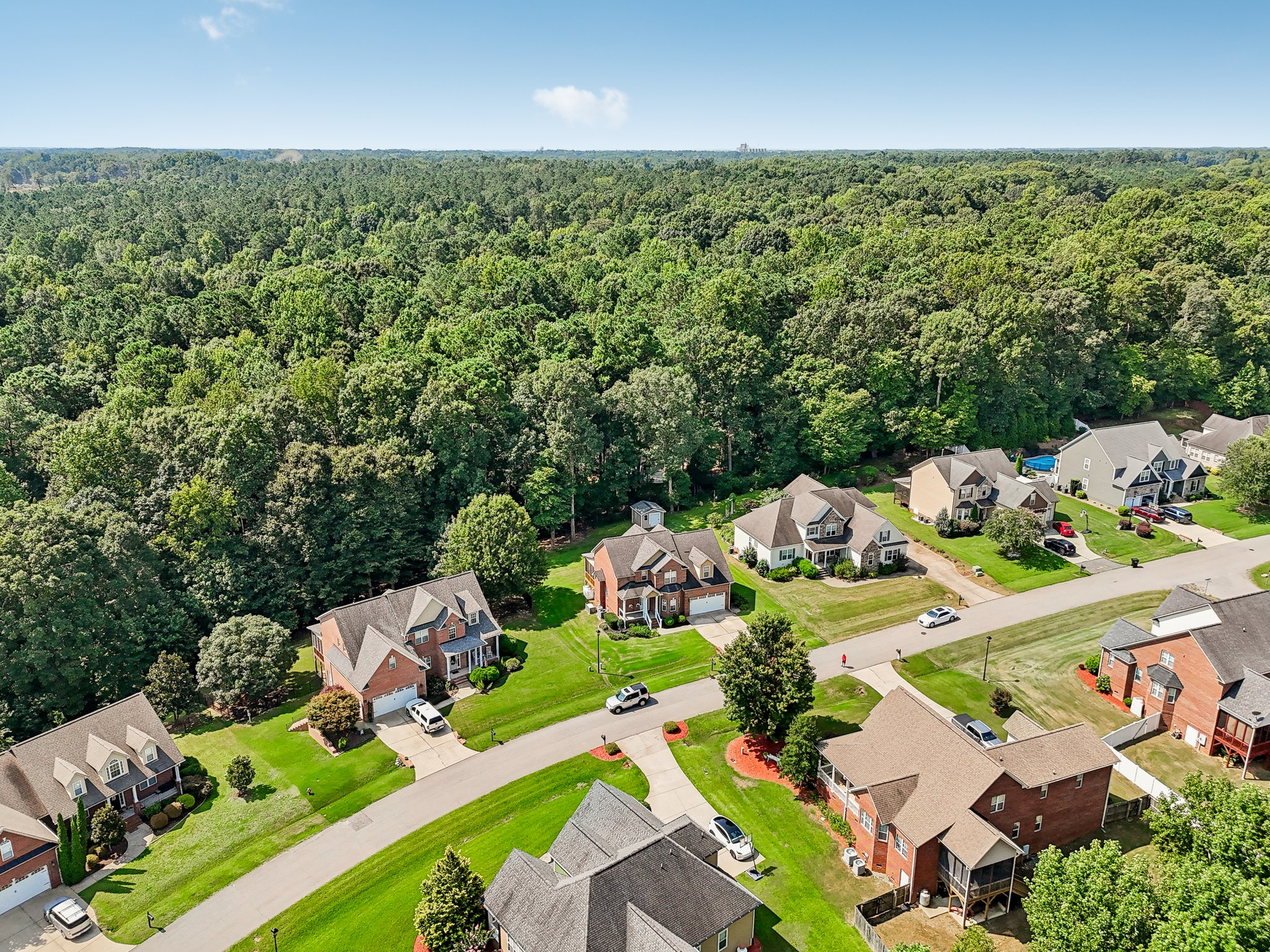 Drone aerial view of a Triangle neighborhood showing homes and streets