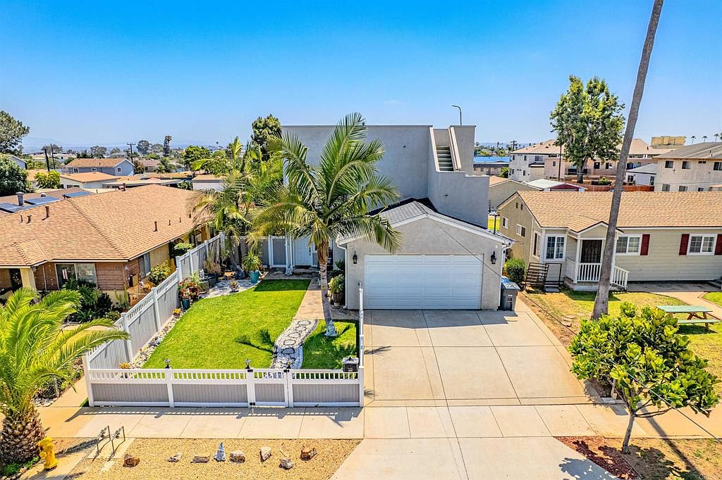 Modern architectural home at 569 Delaware St, Imperial Beach with landscaped front yard