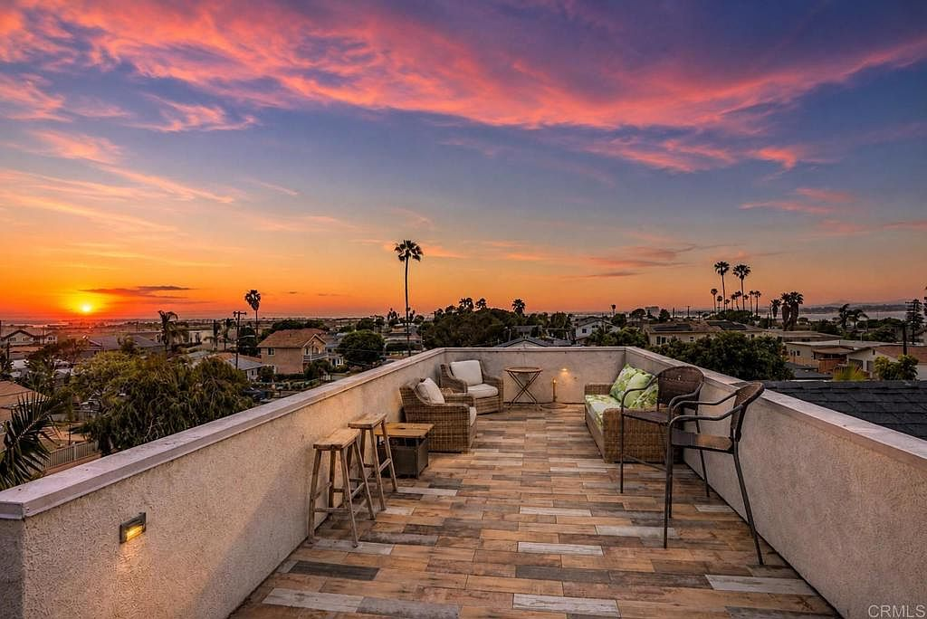 Rooftop deck with panoramic sunset views over the ocean