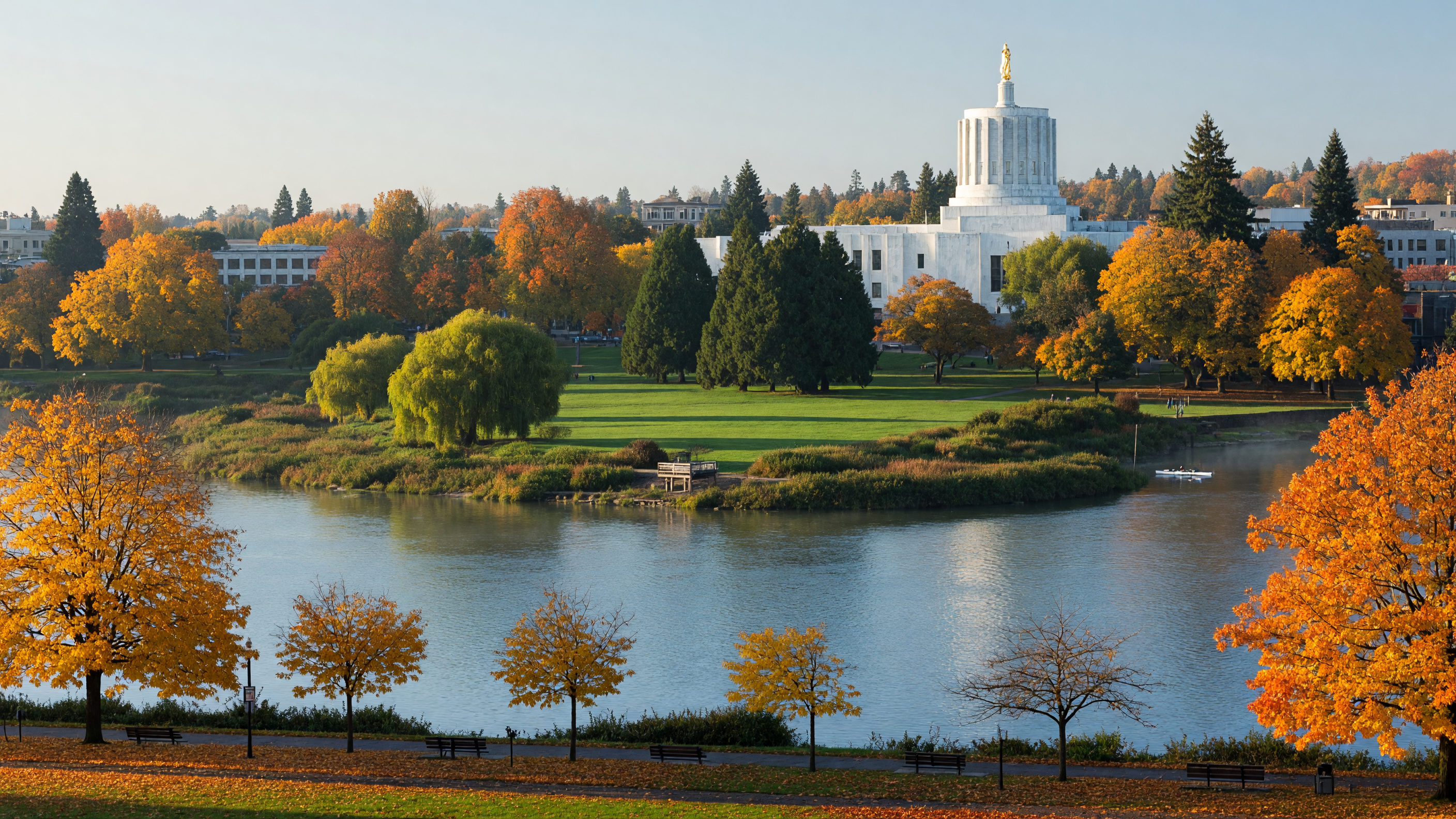 Salem, Oregon riverfront with Minto-Brown Island Park and the Oregon State Capitol visible beyond the Willamette River