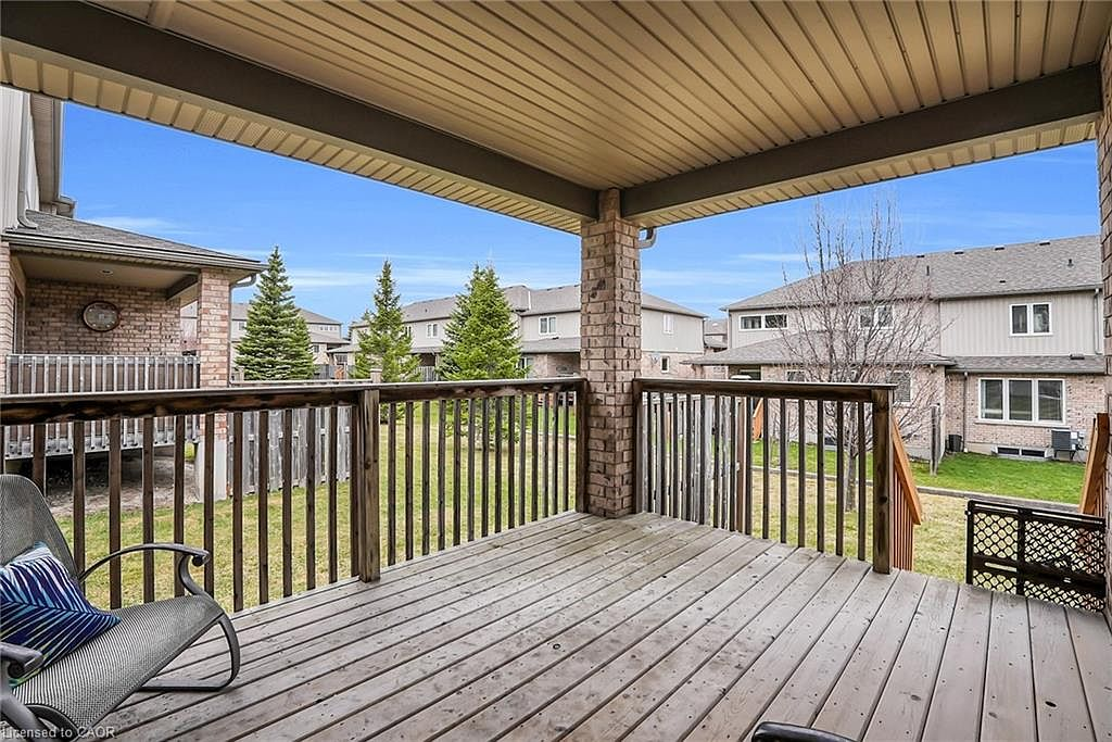 Covered back deck with brick pillars