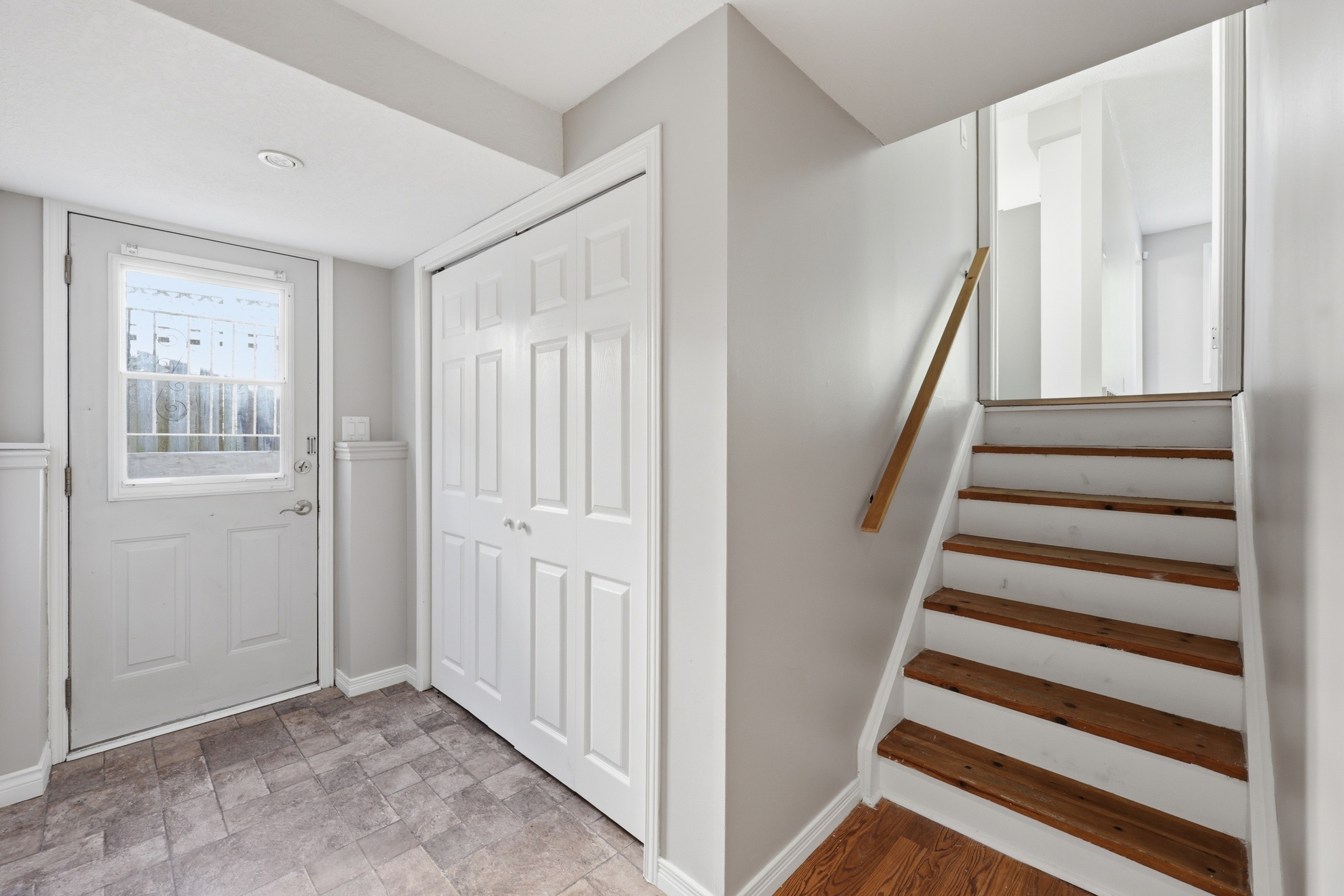 Foyer and split-level stairwell
