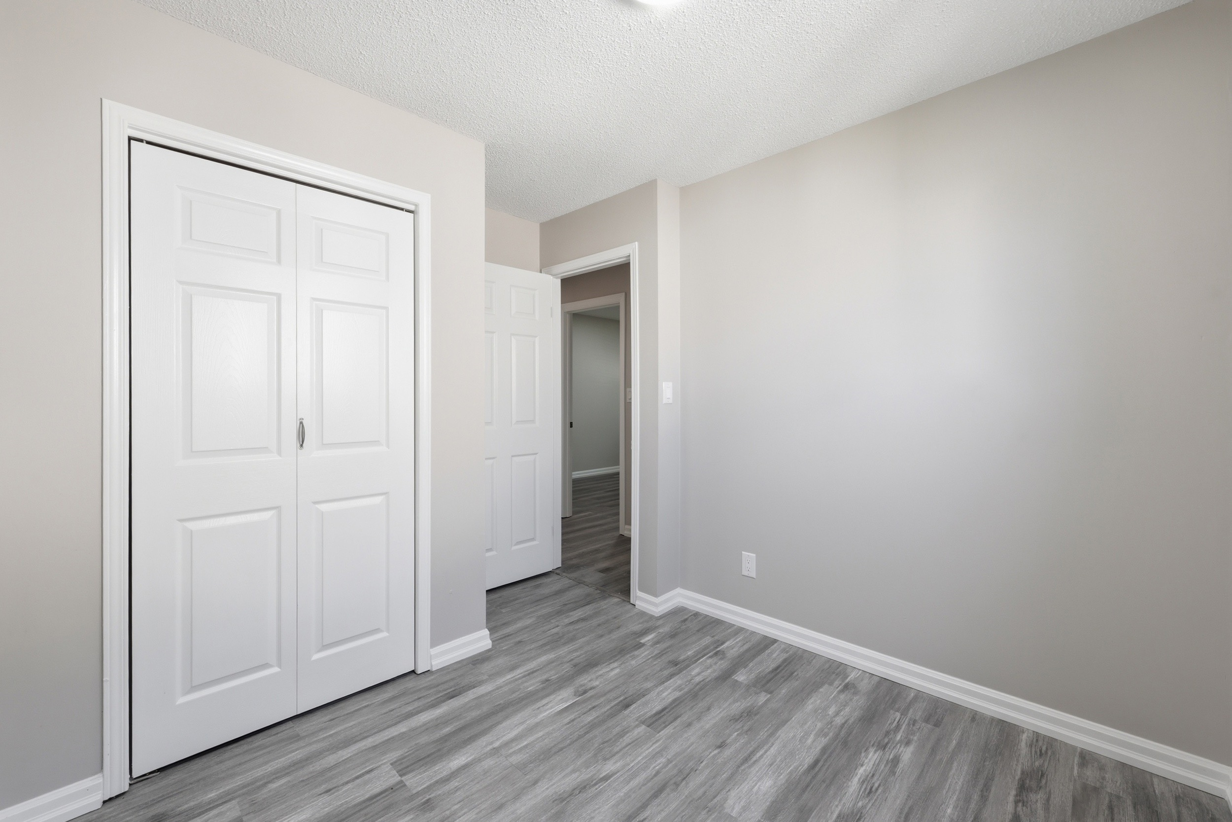 Secondary bedroom from doorway angle
