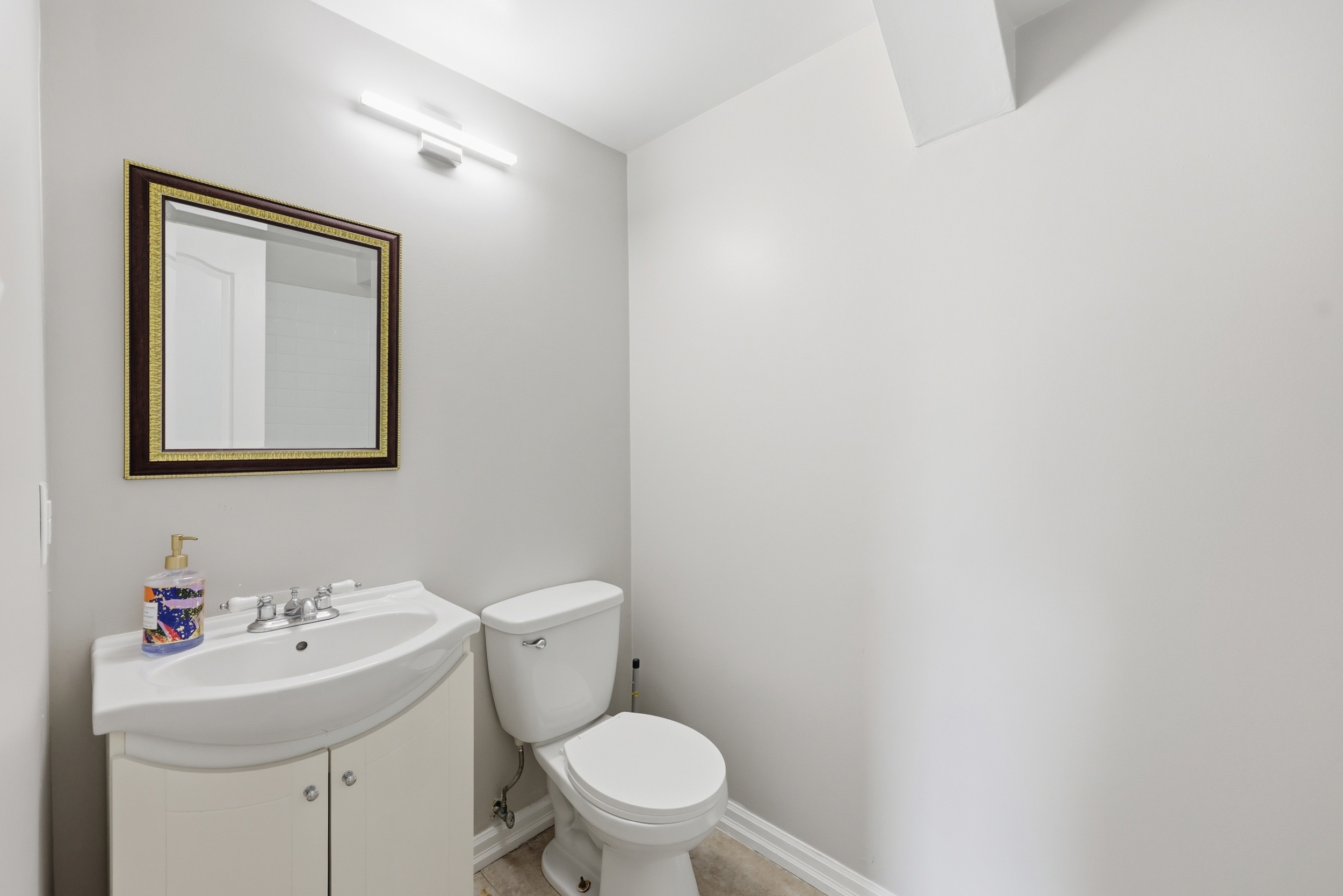 Powder room with neutral finishes