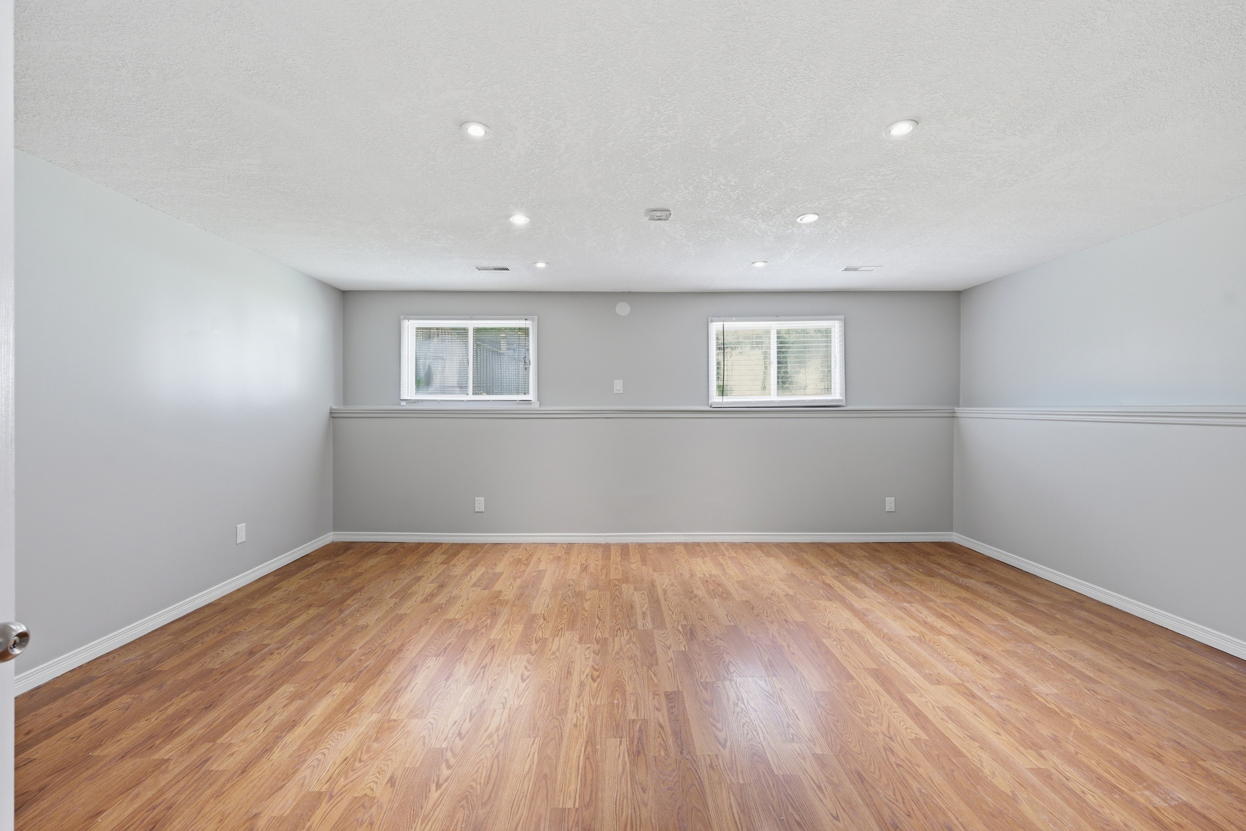 Lower level recreation room with egress windows