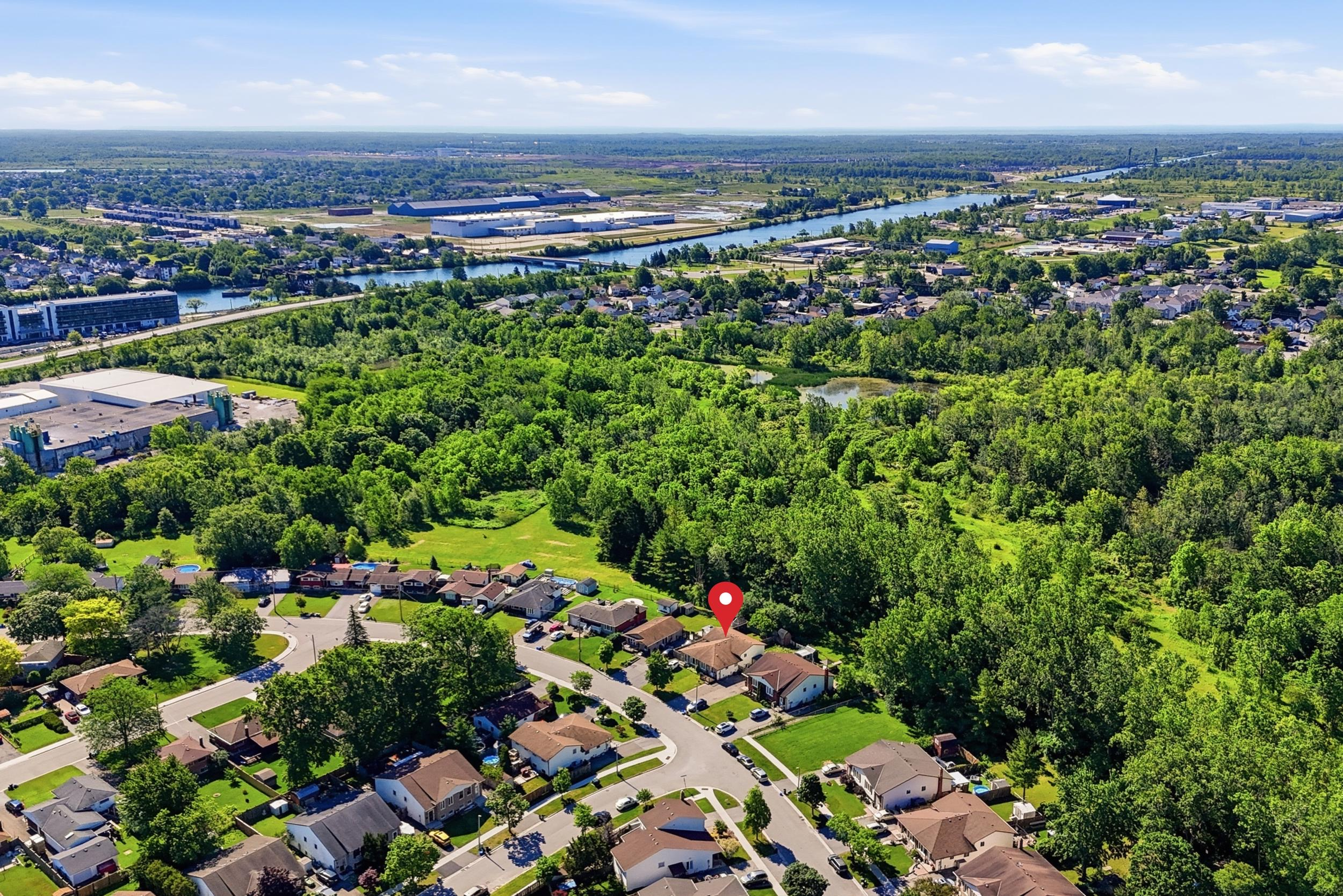 Aerial drone shot of residential street and homes