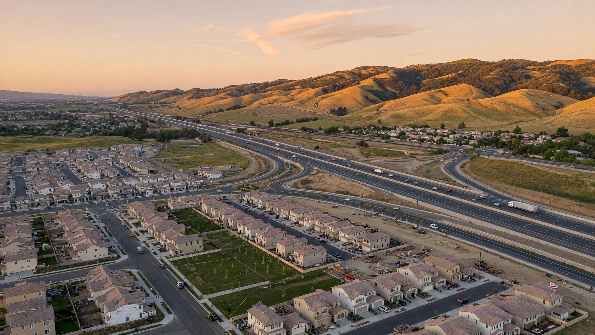 Aerial panoramic view of Santa Clarita Valley showing growth and development across the valley floor