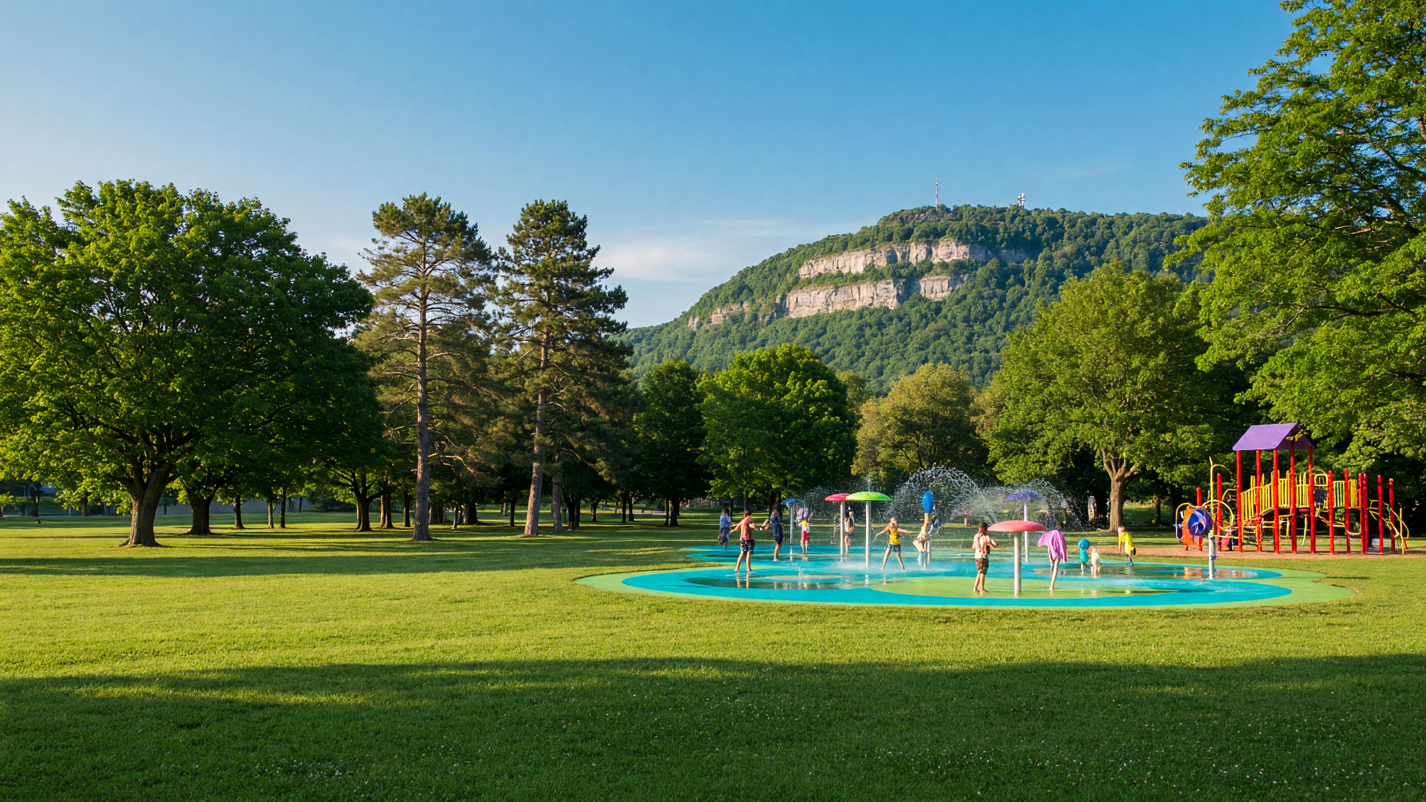 Sunny park with splash pad on Hamilton Mountain