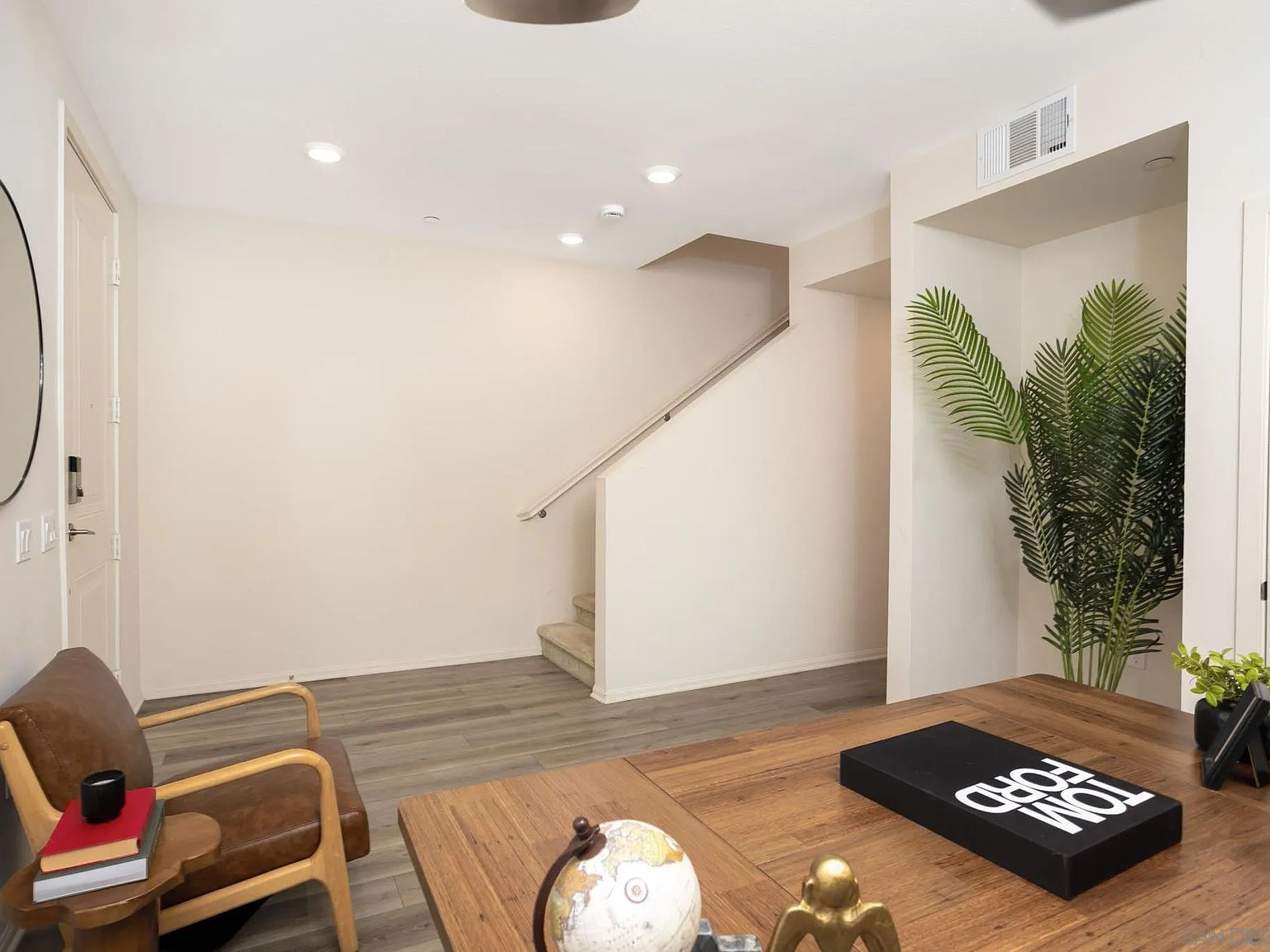 Entryway and stairs with modern furnishings
