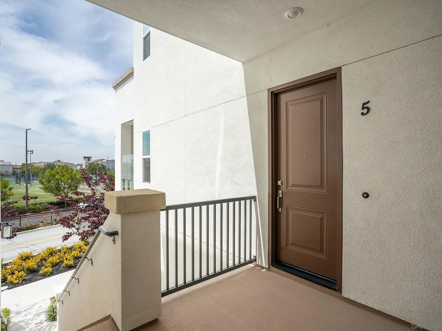 Front door entryway with house number 5