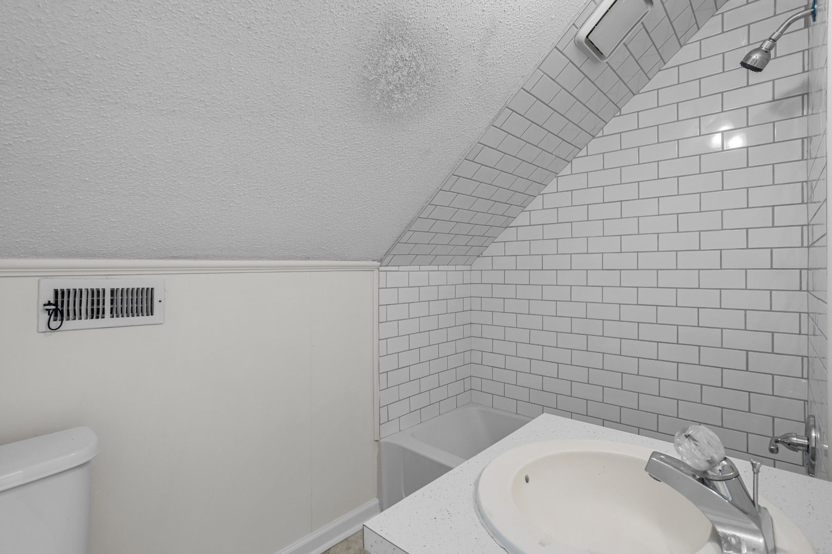 Primary bathroom with new shower and subway tile surround