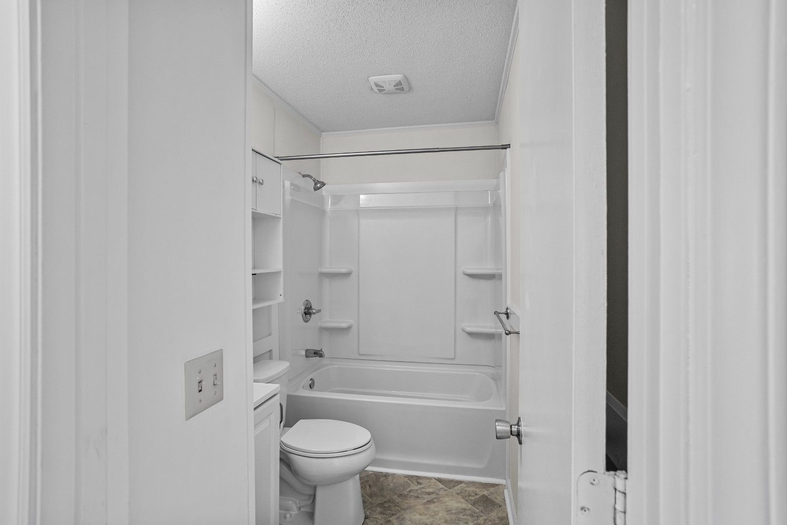 Newly remodeled main-level hall bathroom with fresh finishes