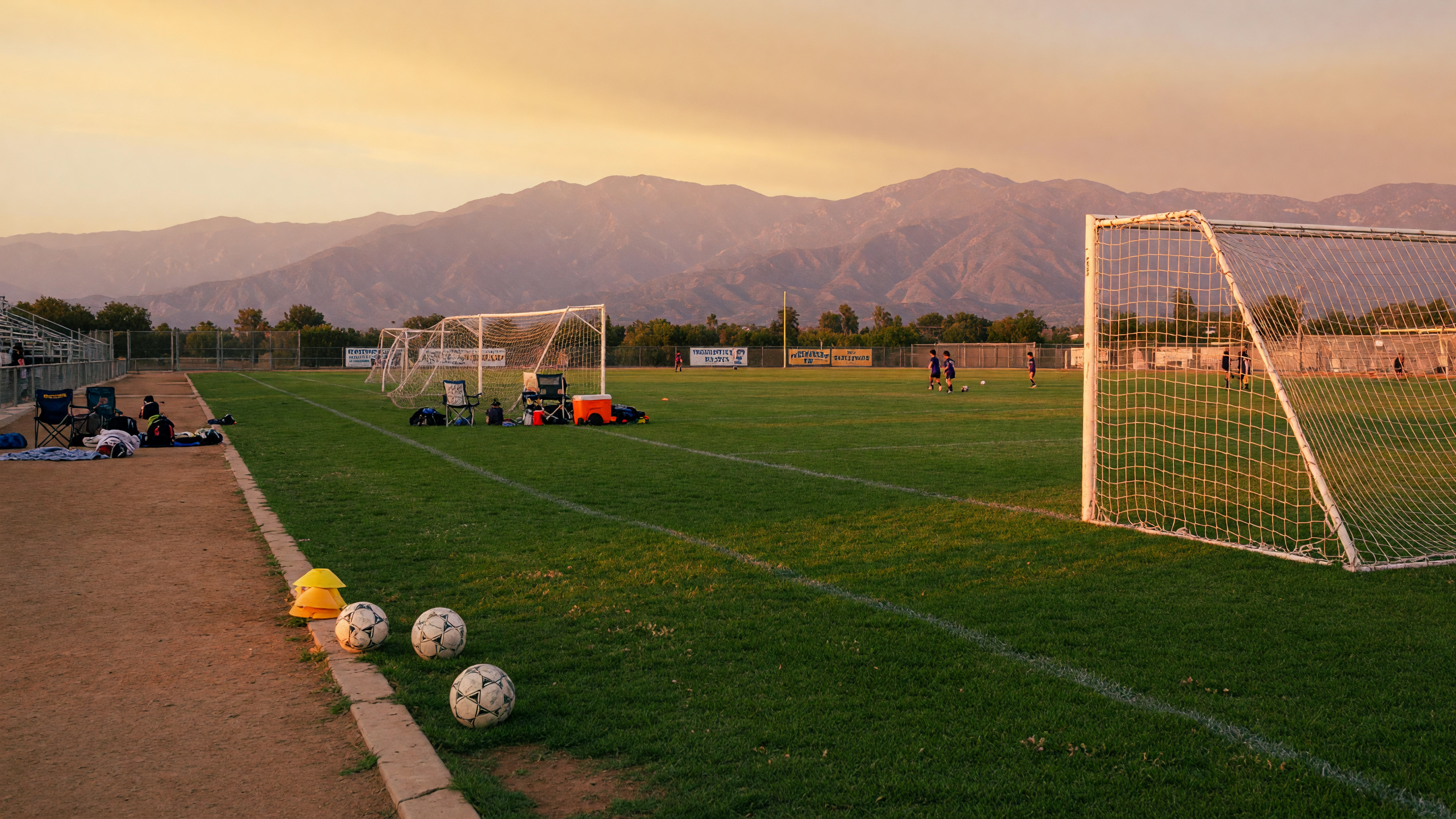 Community soccer field at golden hour in Beaumont California with the San Gorgonio mountains in the distance — the beautiful game runs deep in the Pass Area