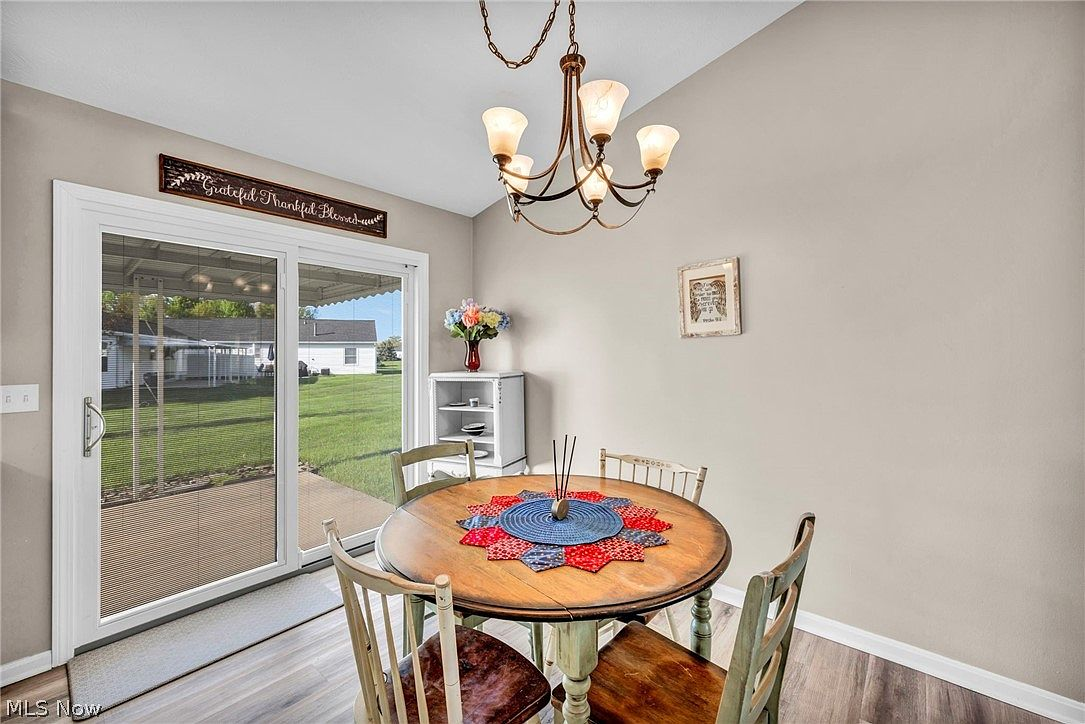 Dining nook with natural daylight from sliding glass door