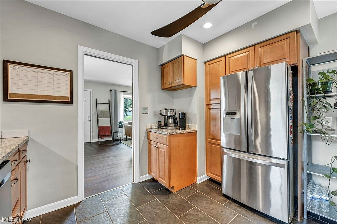 Kitchen view with refrigerator nook