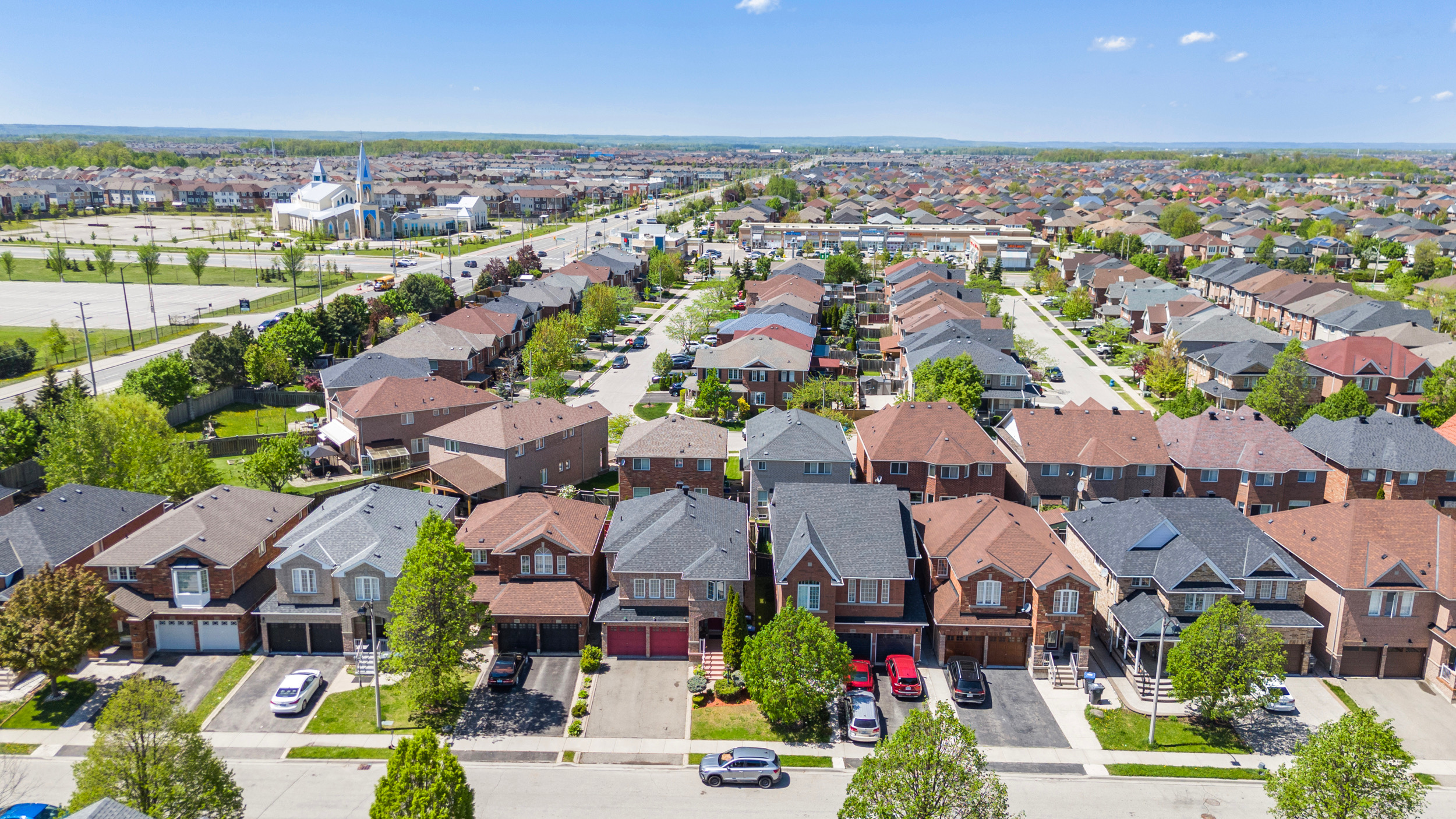 Drone aerial view of Fletcher's Meadow neighbourhood in Brampton