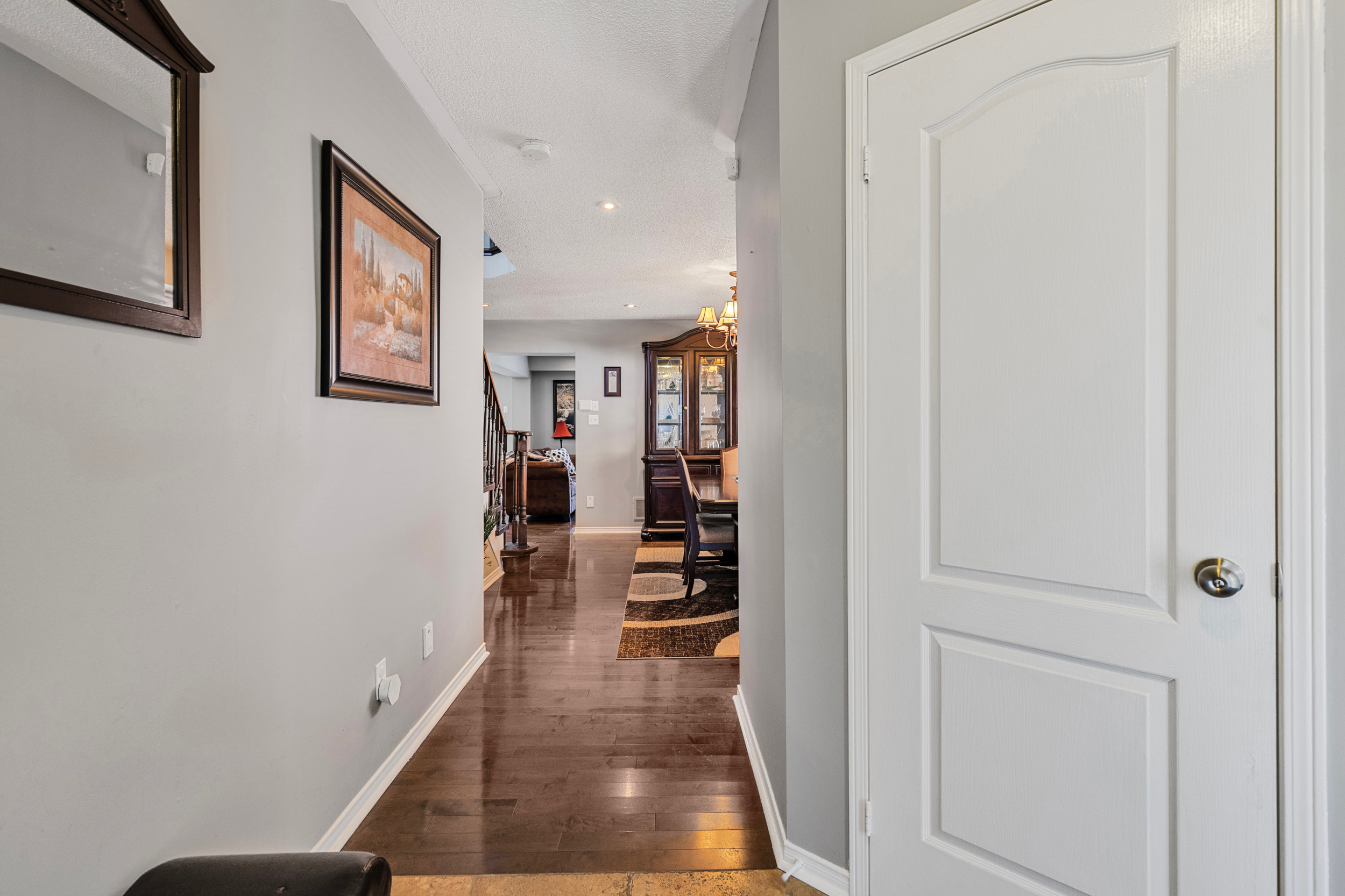 Entrance hallway looking toward dining area and staircase