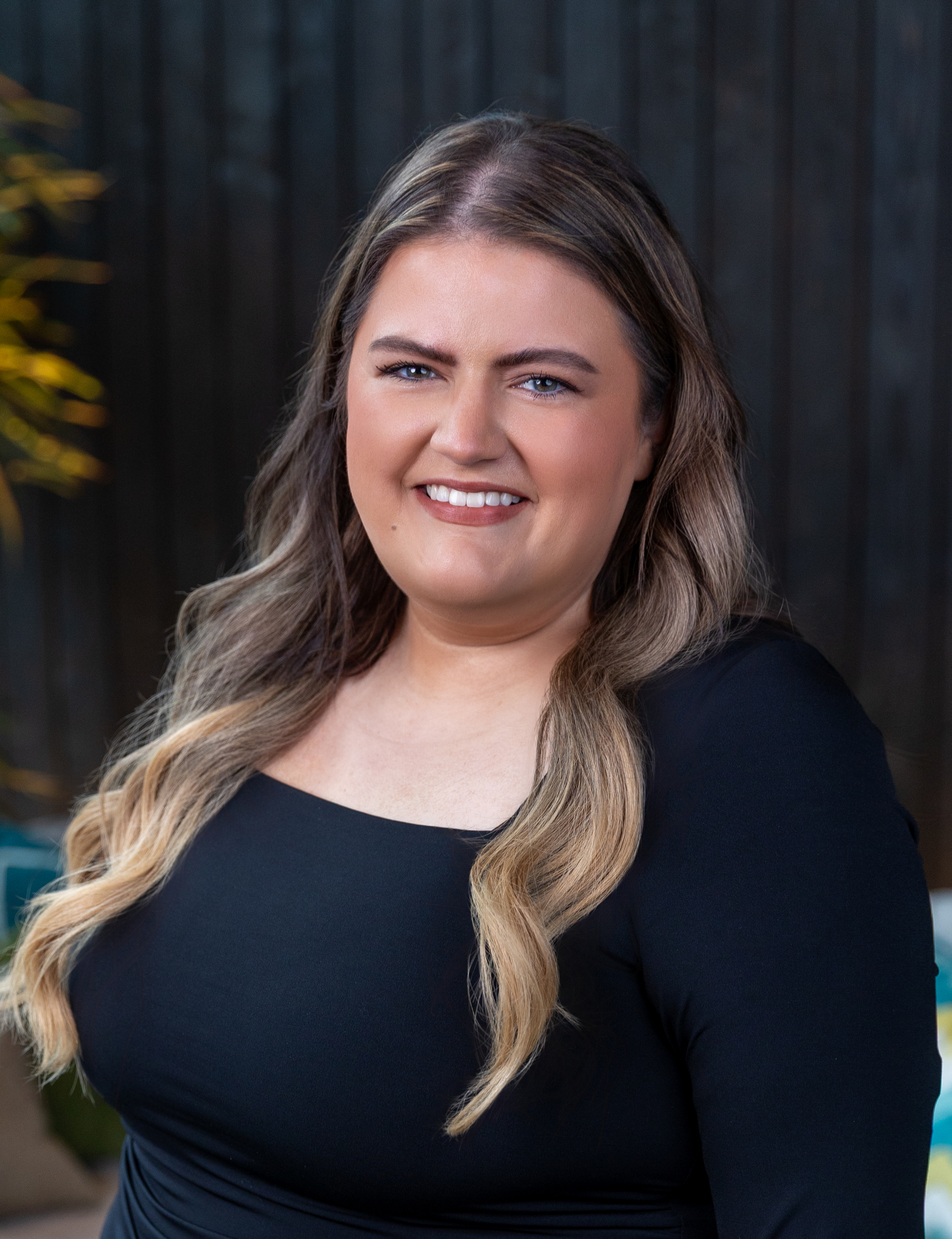 Professional headshot of Hannah Turner, Chief Operations Officer at Davis Real Estate