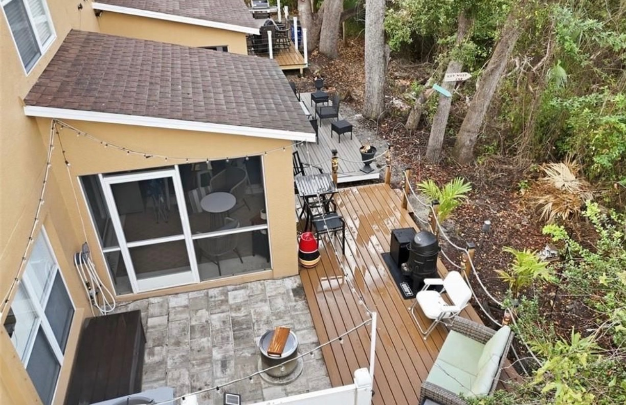 Backyard deck and patio area at 15150 Piping Plover Ct #103 in Bayshore Commons