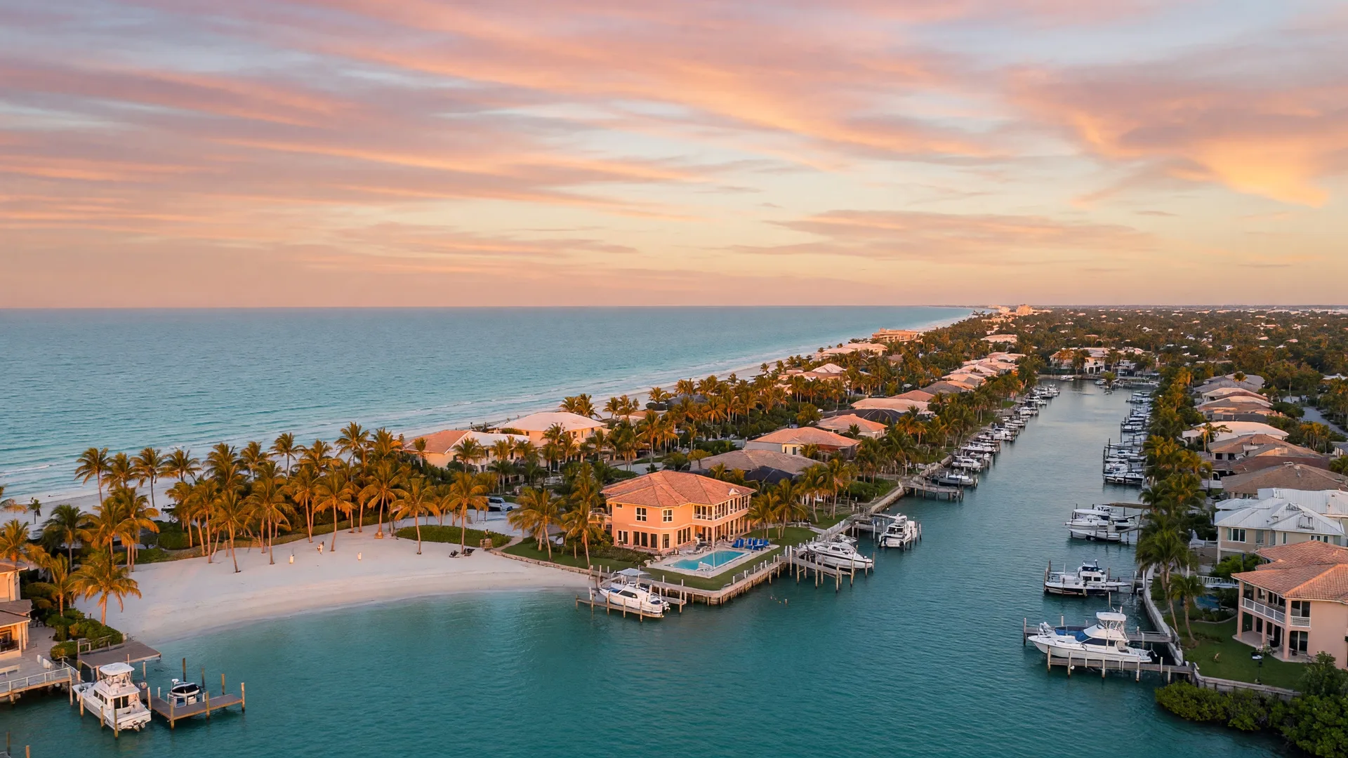 Southwest Florida coastline at golden hour — turquoise Gulf waters, white sand beaches, and luxury waterfront homes