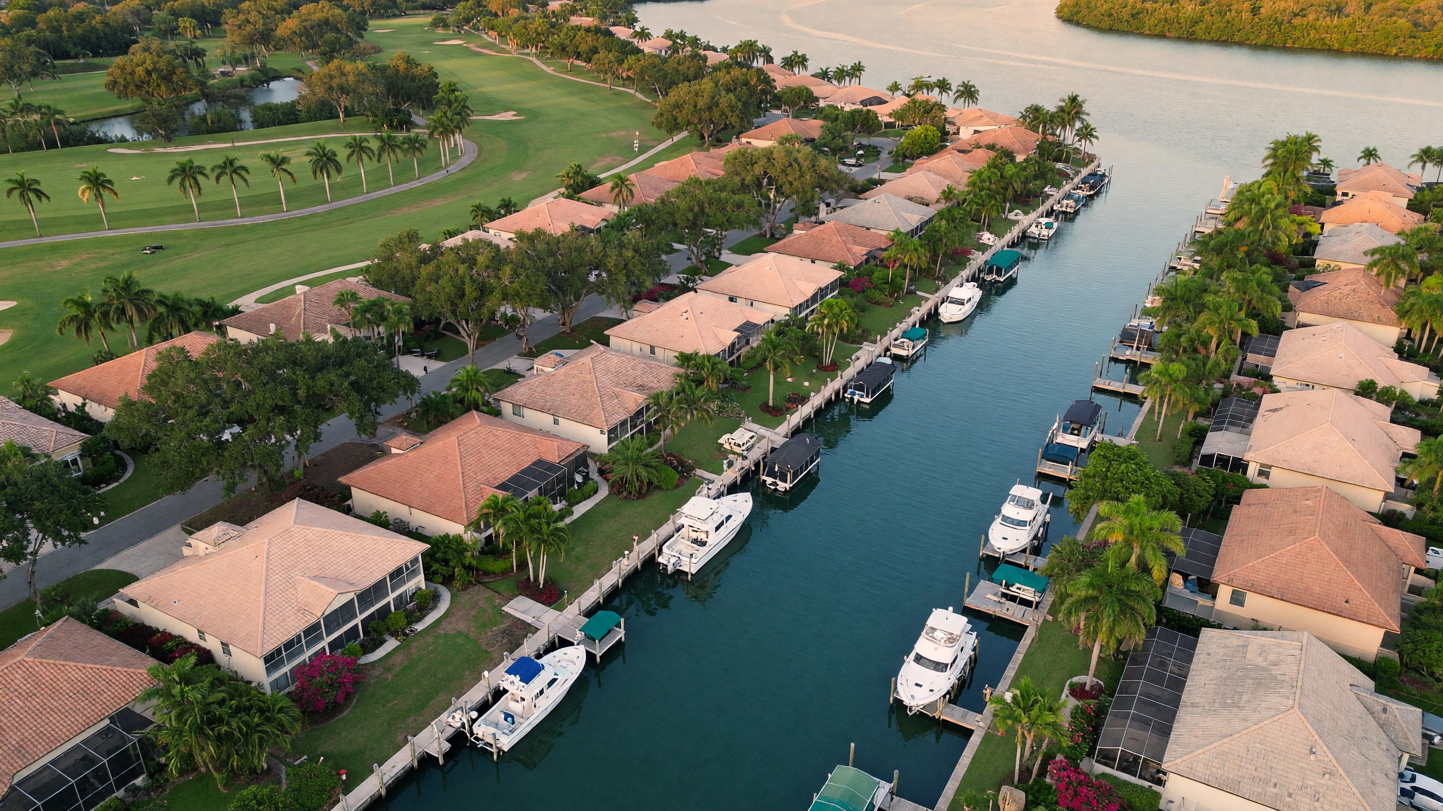 Private boat dock behind a waterfront home in Spanish Wells, Bonita Springs