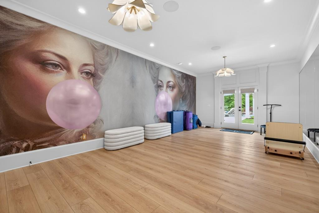 Specialty gym room with mural feature wall