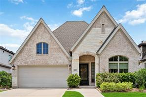 Exterior brick facade of 16903 Lupine Meadow Lane in The Groves, Humble, Texas