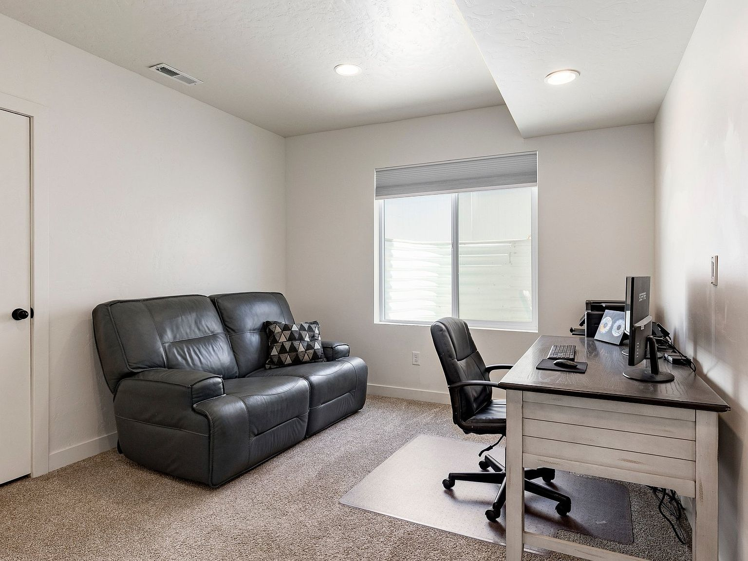 Bedroom configured as home office