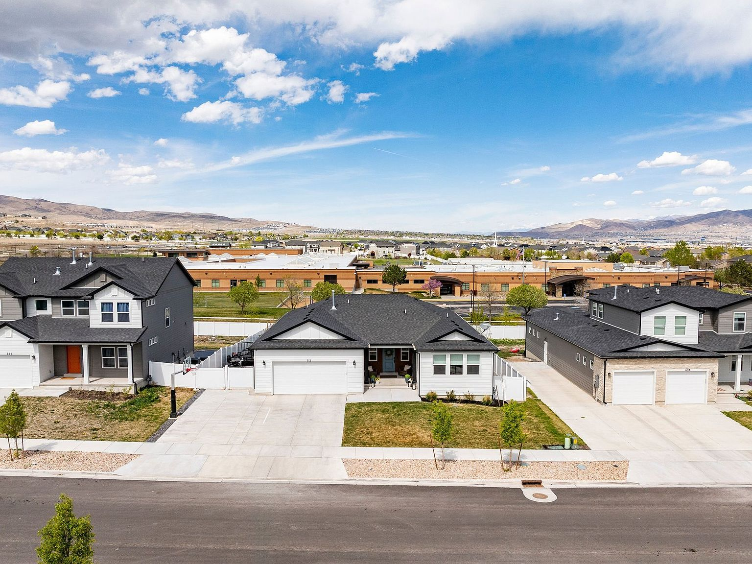 Aerial view of front exterior and street