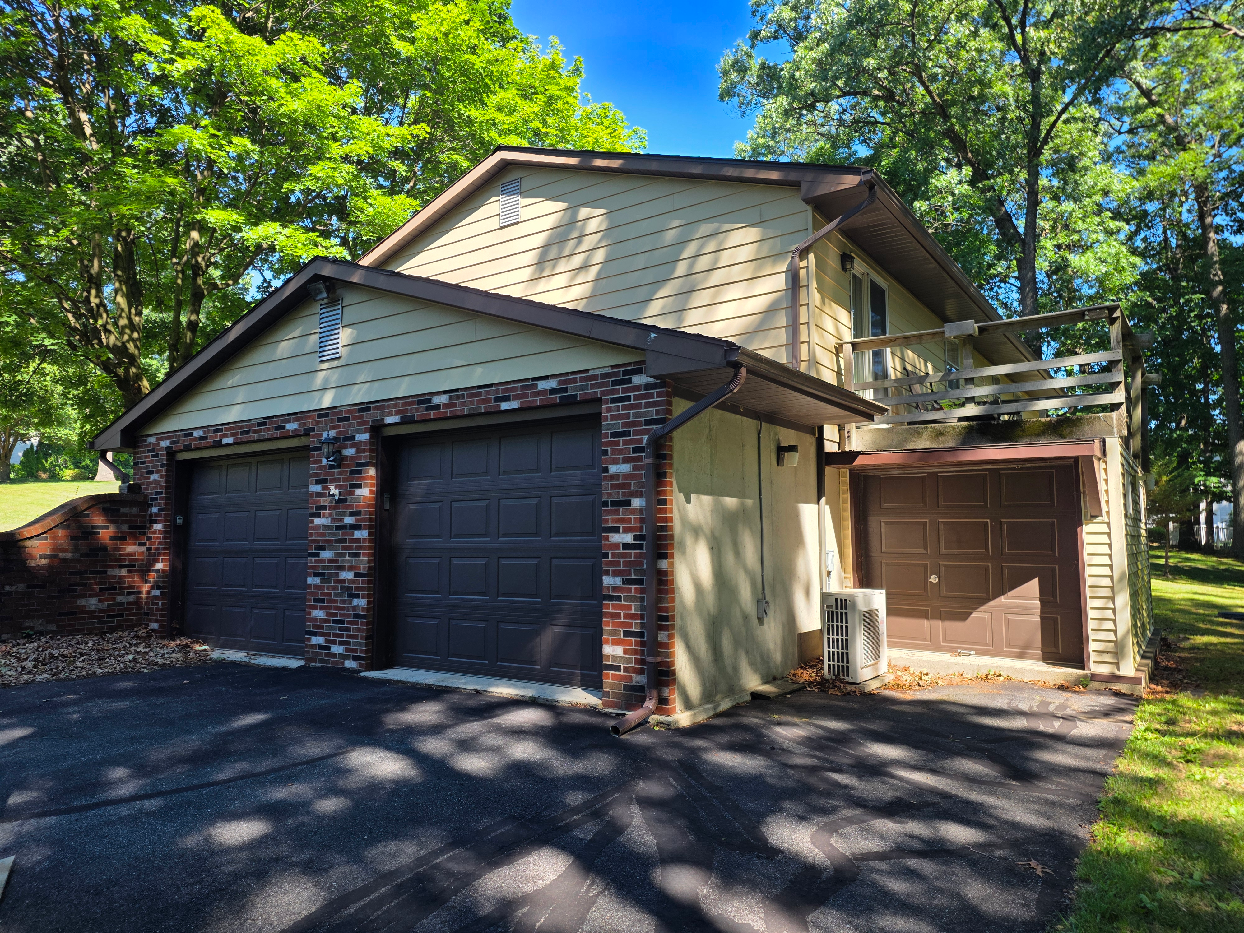 2.5-car garage with deck above
