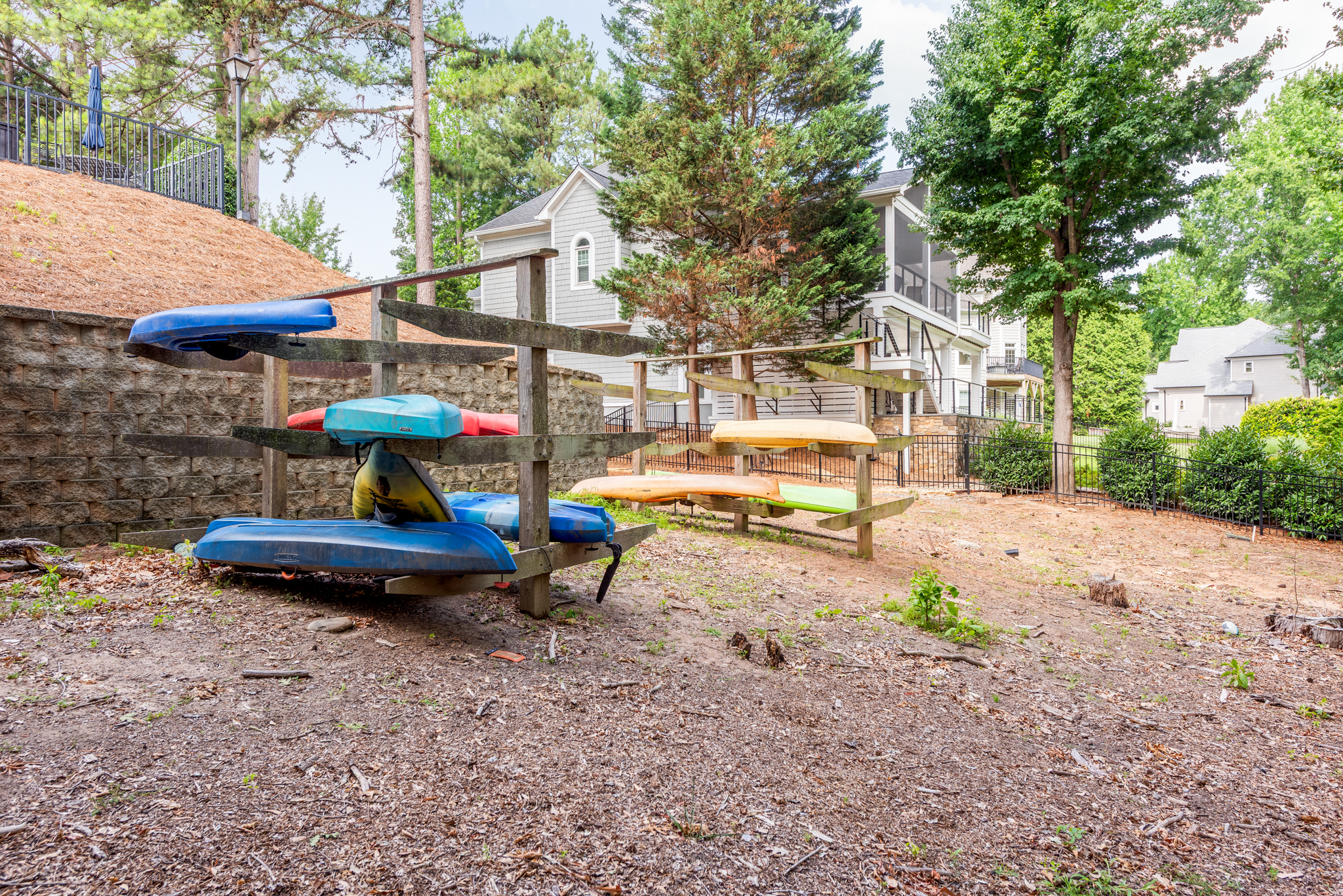 Community kayak storage racks at the shared waterfront area