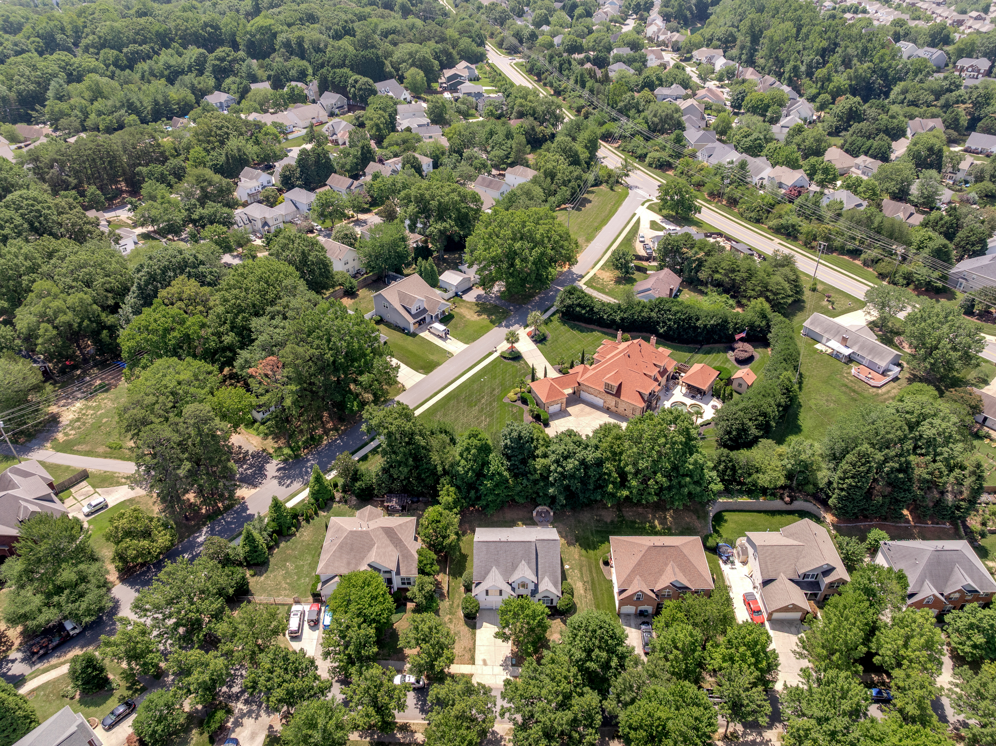 High-altitude drone shot of the Cornelius neighborhood with established tree canopy