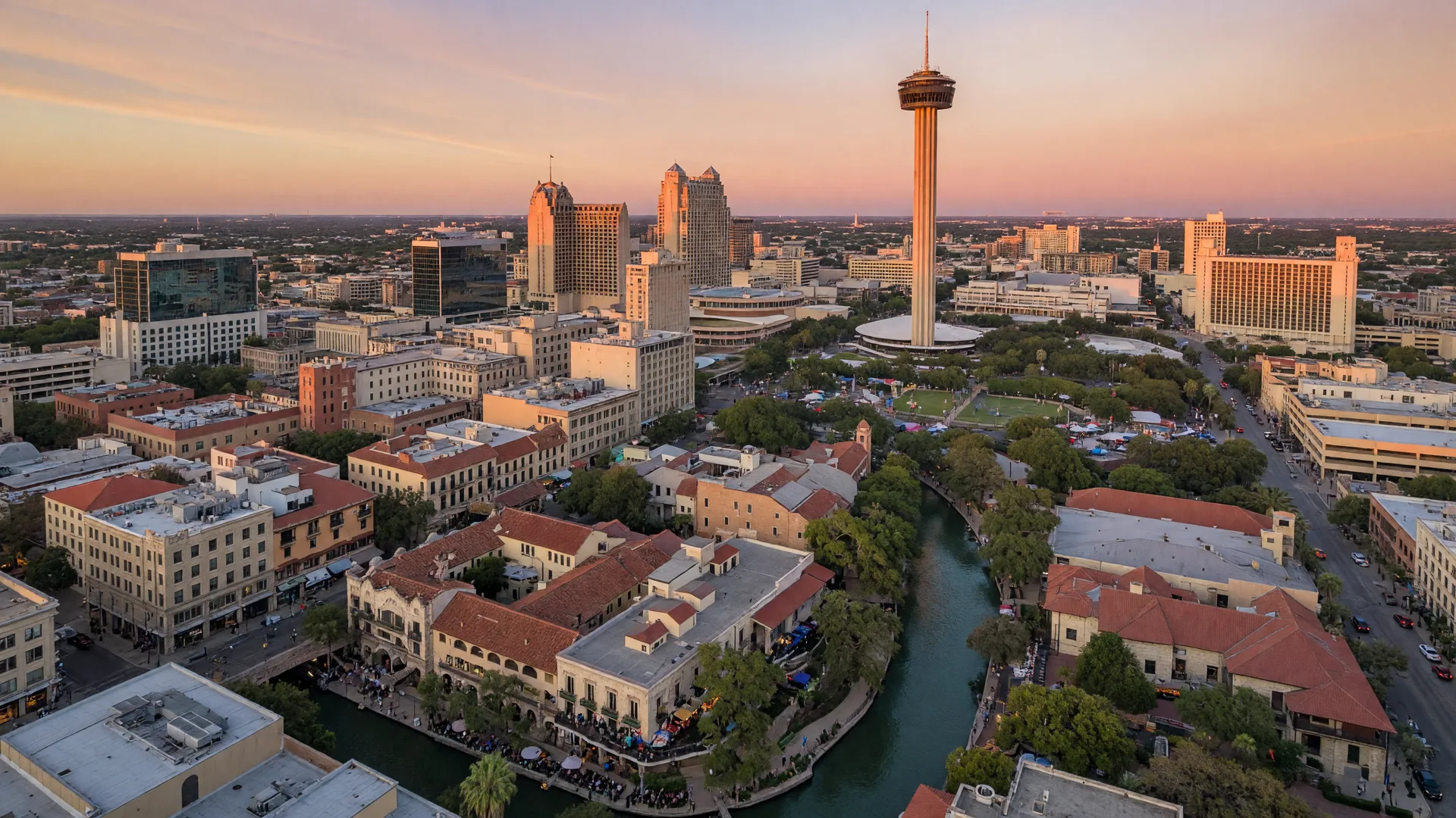 San Antonio Texas at golden hour with the Tower of the Americas and River Walk area
