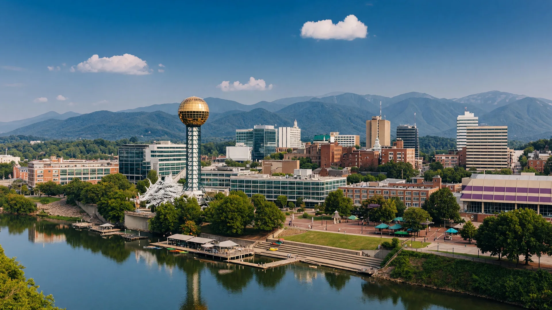 Knoxville Tennessee's downtown skyline with the iconic Sunsphere from the 1982 World's Fair and the Tennessee River