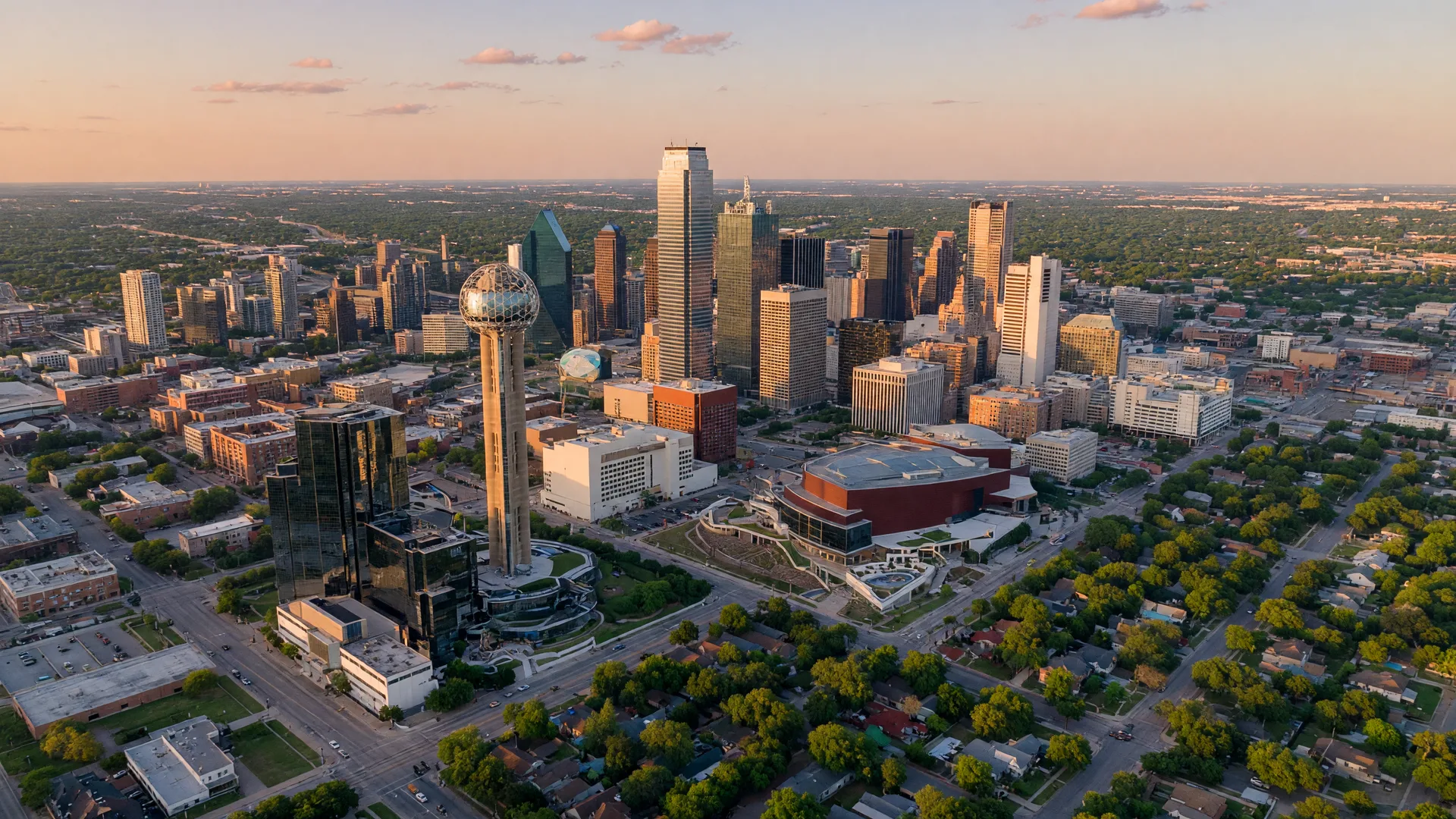 Dallas Texas skyline at golden hour with modern skyscrapers and surrounding neighborhoods