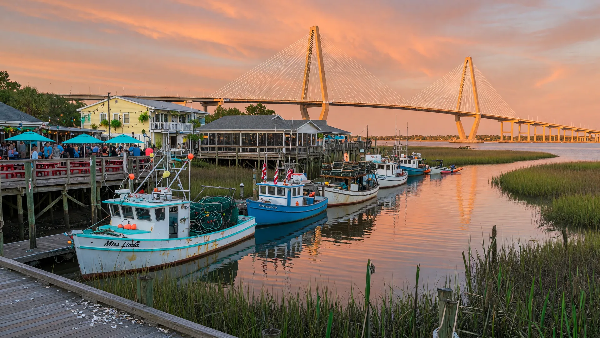 Mount Pleasant South Carolina waterfront at Shem Creek with shrimp boats and the Ravenel Bridge in the background