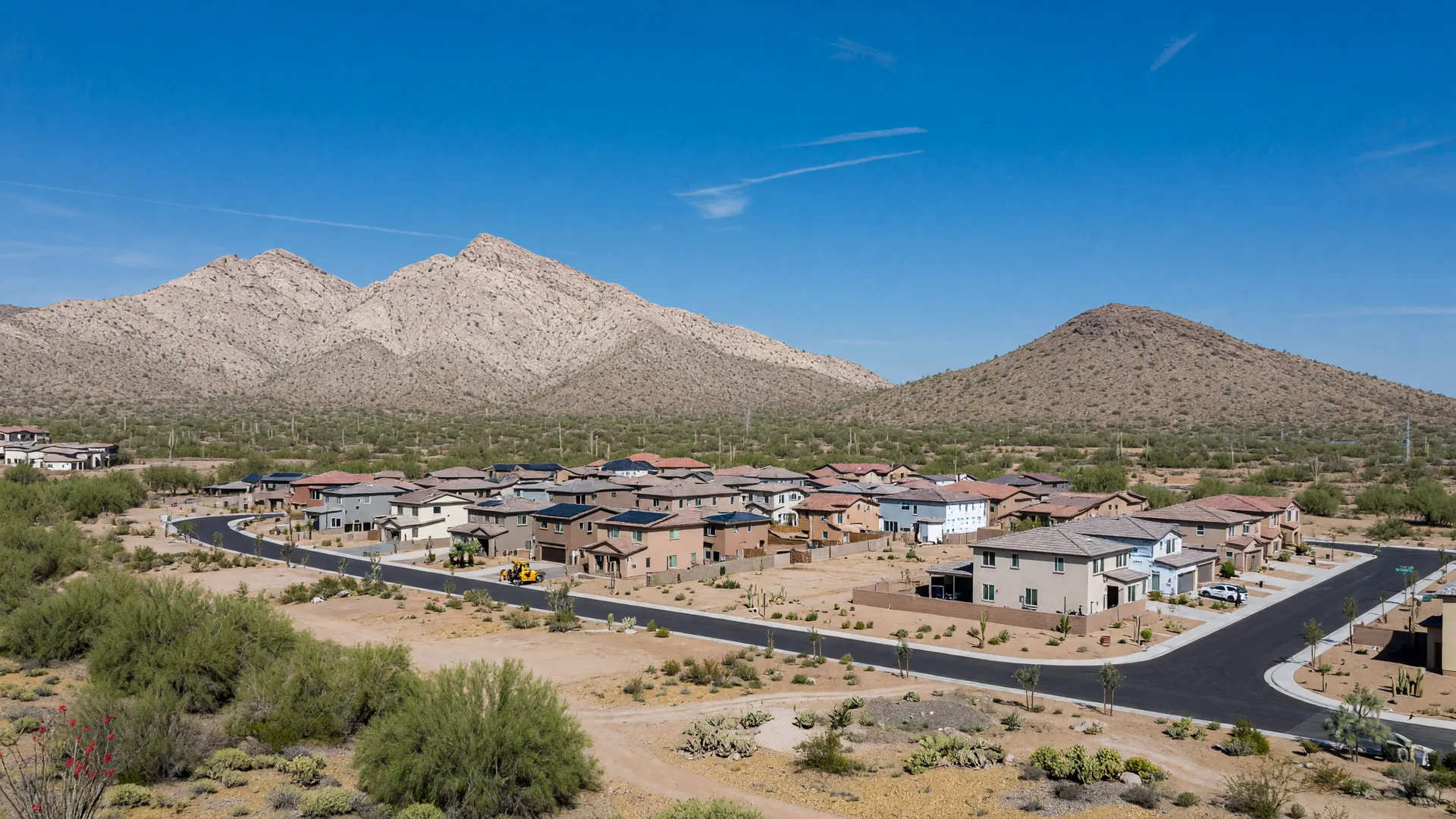 Surprise's desert setting with the Ben Avery Mountain or White Tank Mountains, northwest valley open landscape, newer suburban desert community