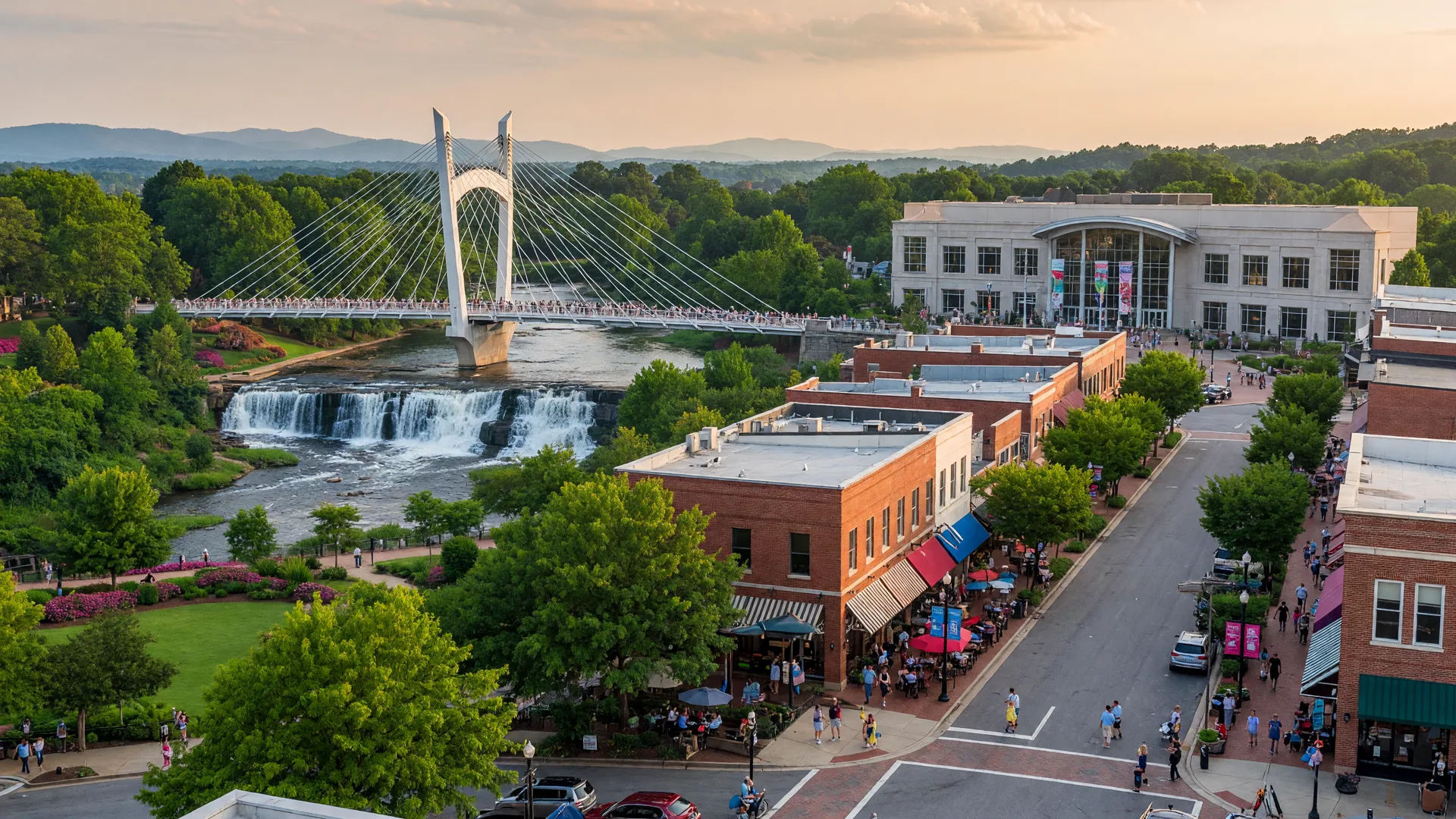 Greenville South Carolina's vibrant downtown Main Street with Falls Park on the Reedy and the Liberty Bridge