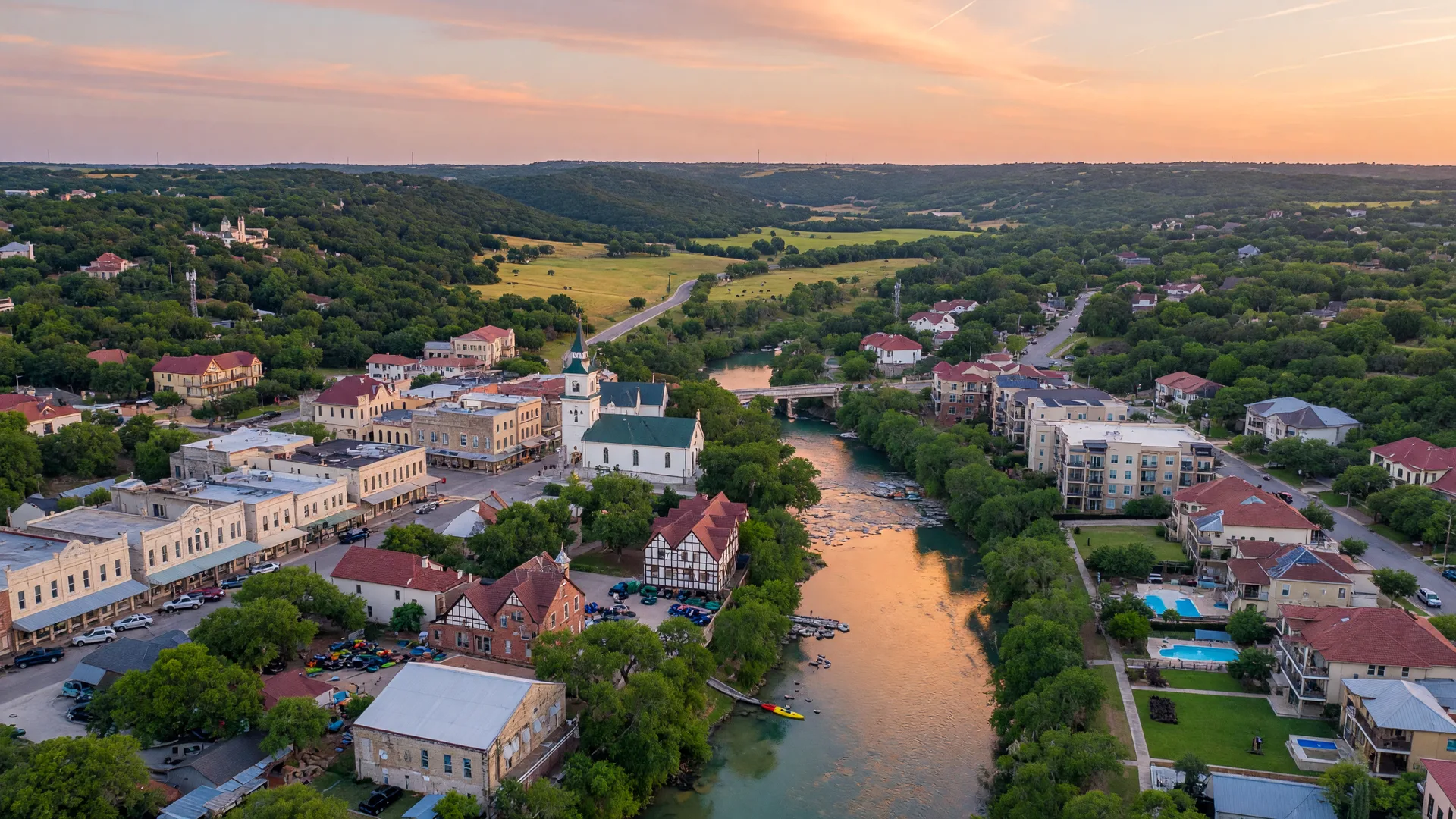 Upscale master-planned community in Prosper Texas with large custom homes and rolling green landscape
